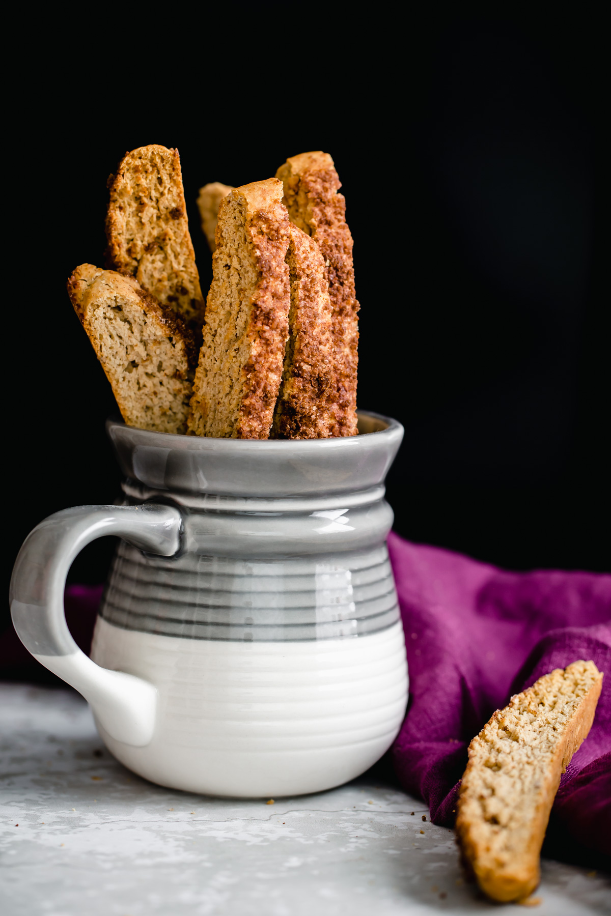 vegan biscotti homemade vegan cinnamon sugar biscotti in a small coffee mug