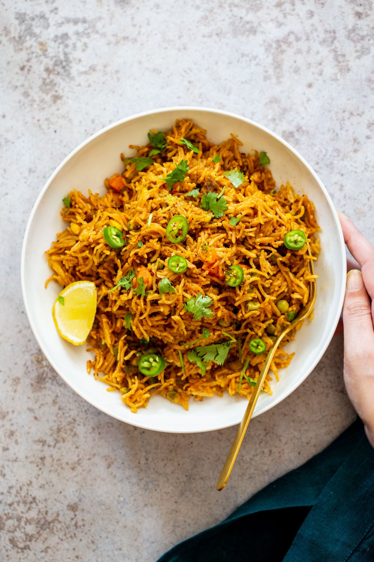 Instant Pot Fried Rice pumpkin fried rice served with sliced of lime and jalapenos