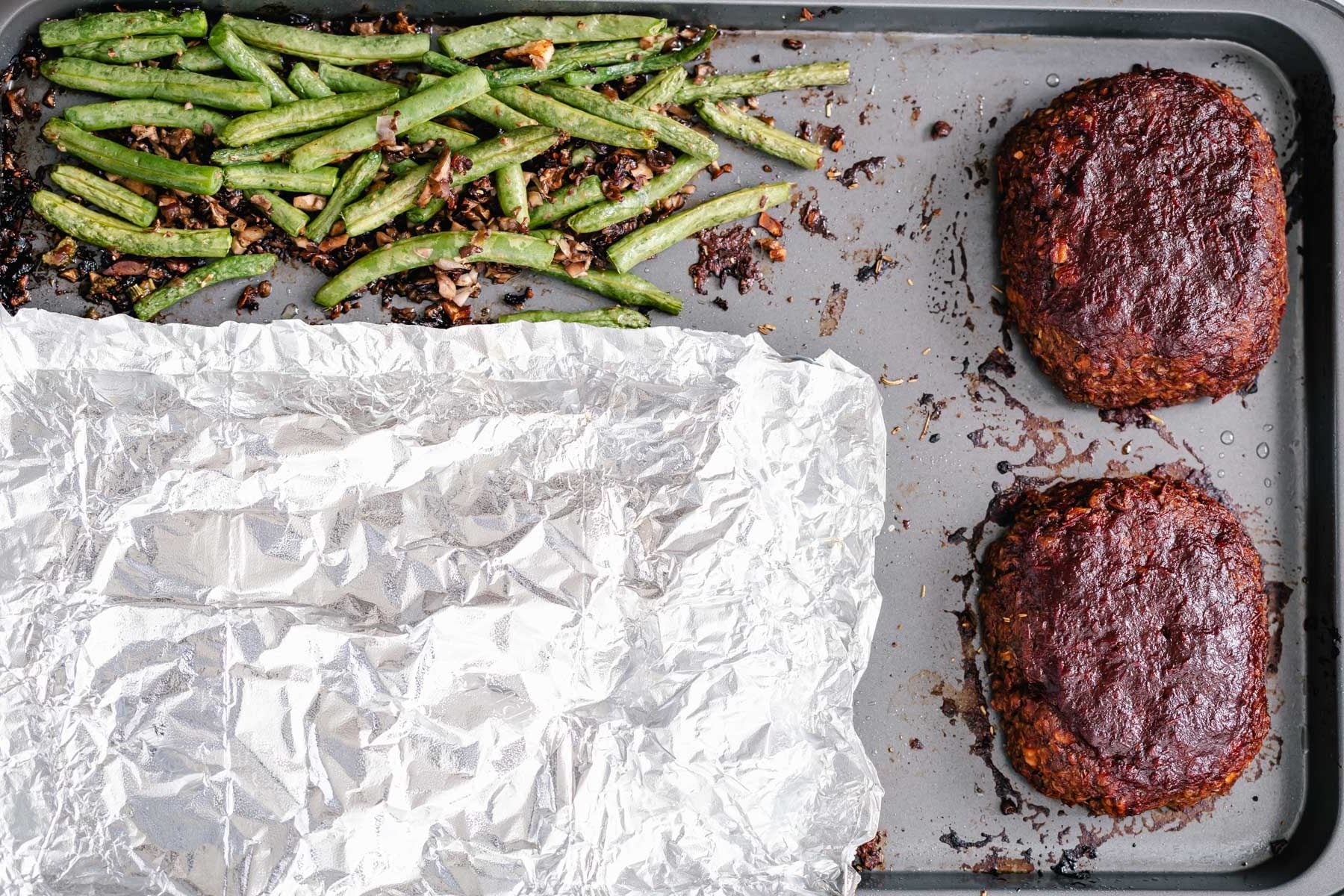 Thanksgiving sheet pan dinner overhead shot of two walnut lentil loaves