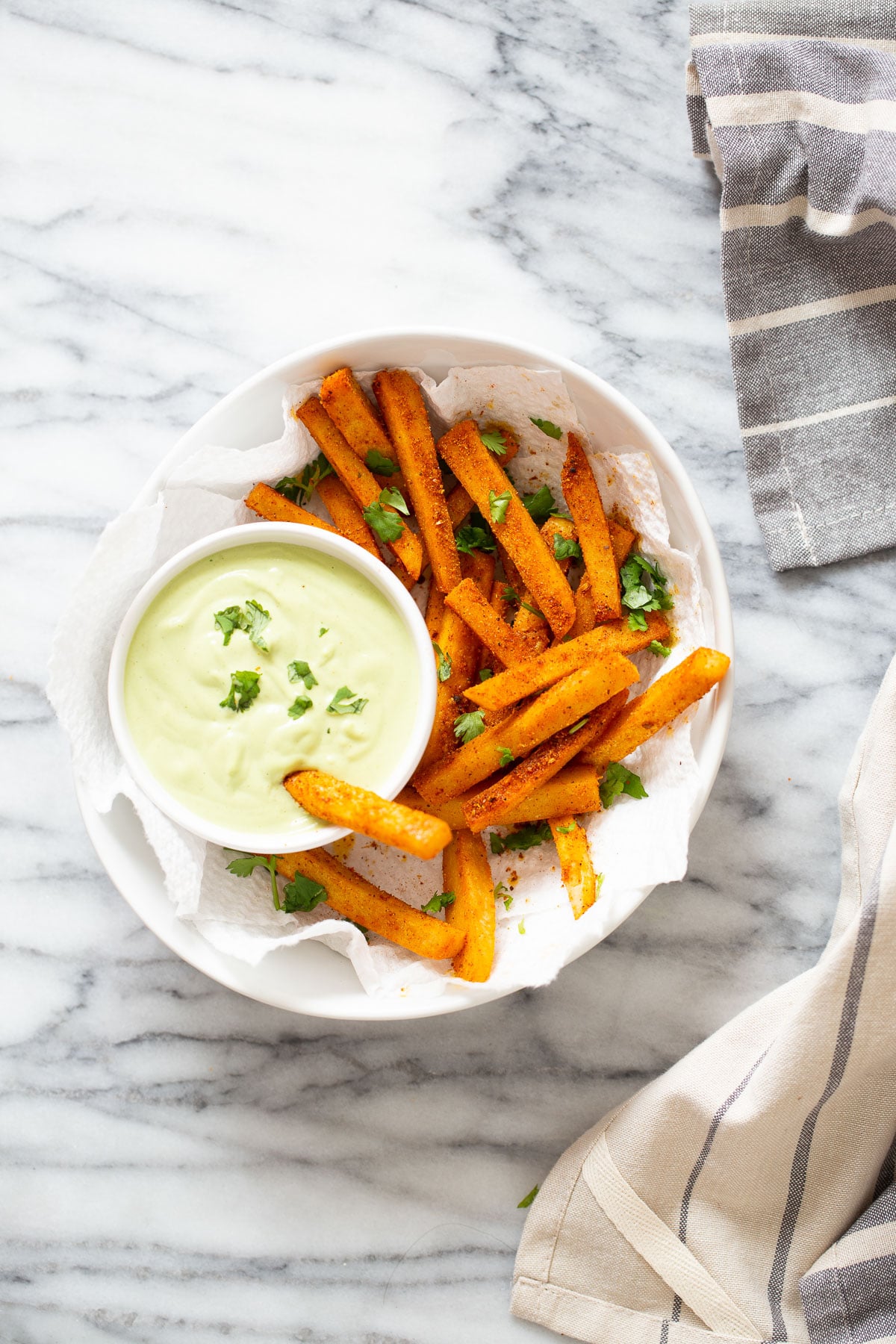 chickpea fries a bowl of pan-fried Cajun chickpea fries served with vegan cilantro lime dip