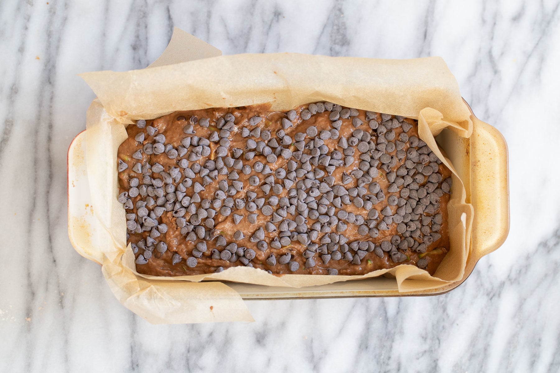 chocolate zucchini bread raw unbaked vegan chocolate zucchini bread sprinkled with chocolate chips