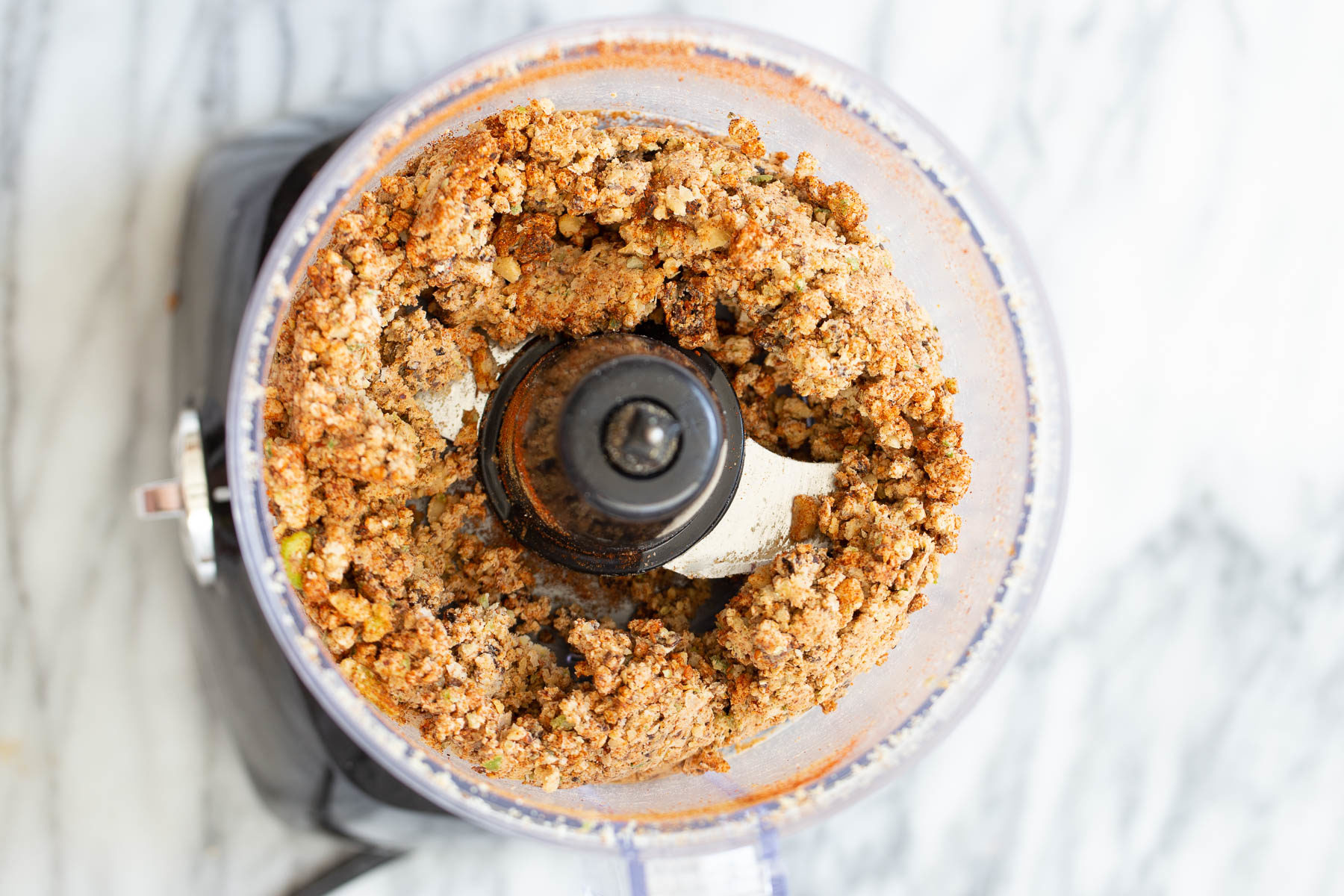 walnut taco meat overhead shot of vegan walnut taco meat in a food processor