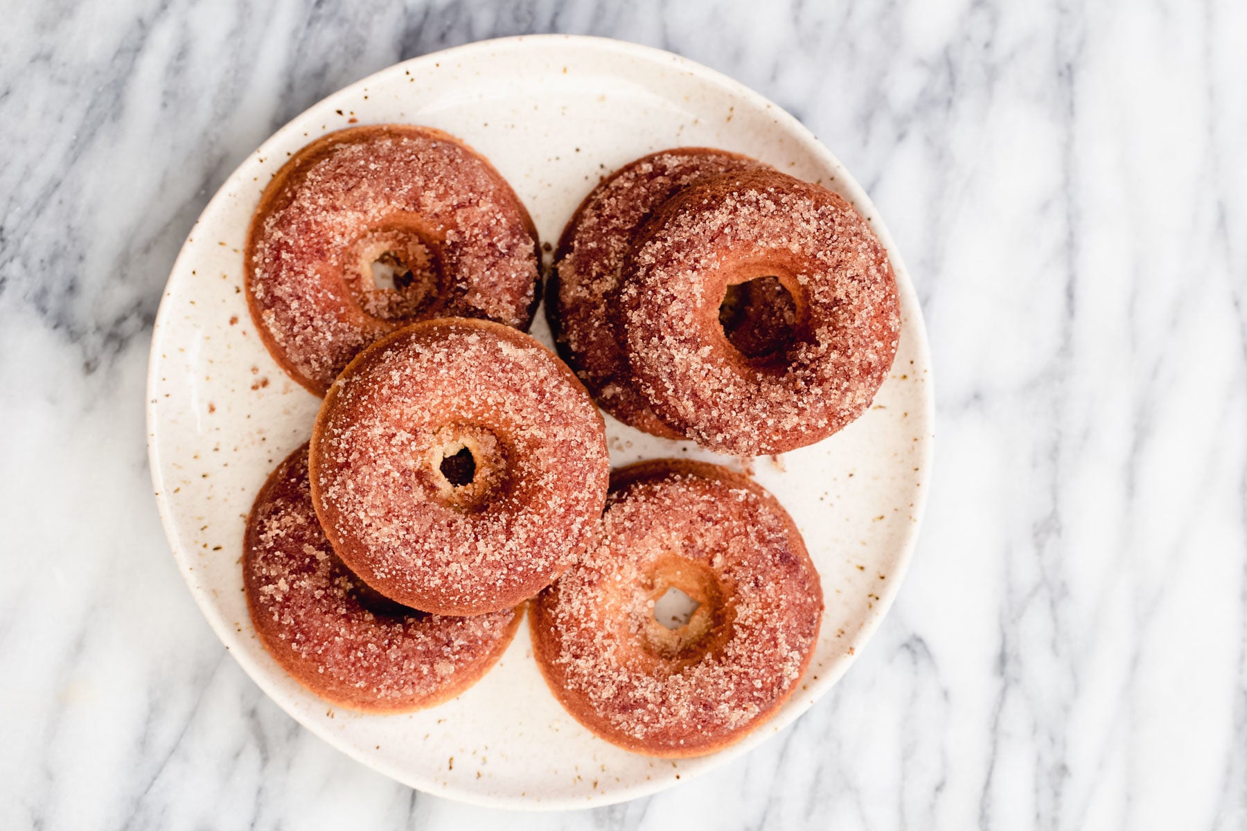 glutenfree donuts recipe freshly baked glutenfree vanilla donuts on a white plate