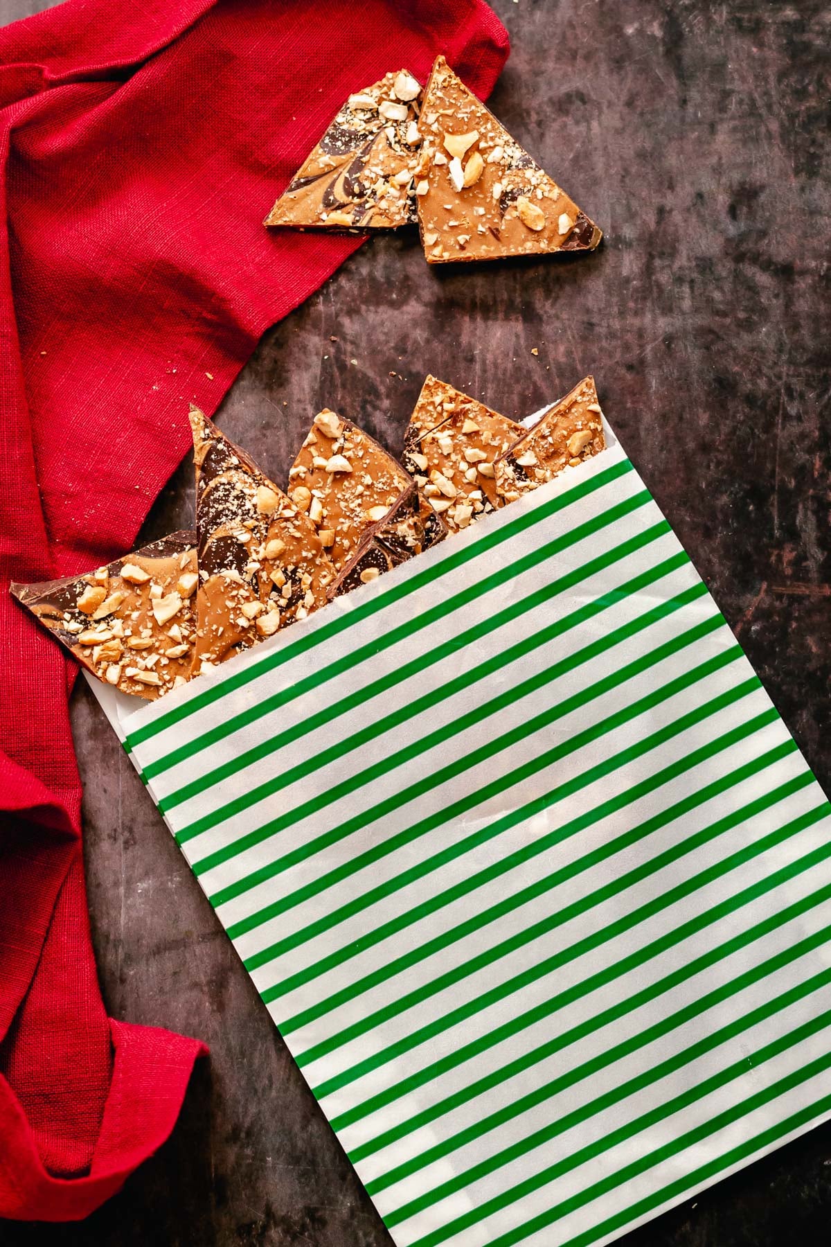 peanut butter chocolate bark vegan peanut butter cup chocolate bark in a small paper bag