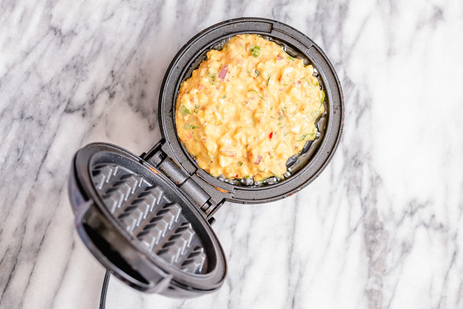 chickpea flour waffles chickpea flour waffle baking in a waffle iron