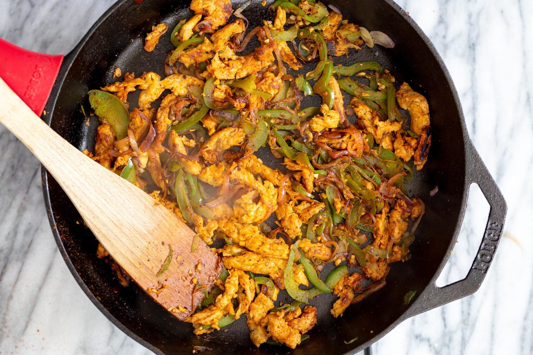 vegan skillet enchiladas filling for vegan skillet enchiladas in a black cast iron skillet