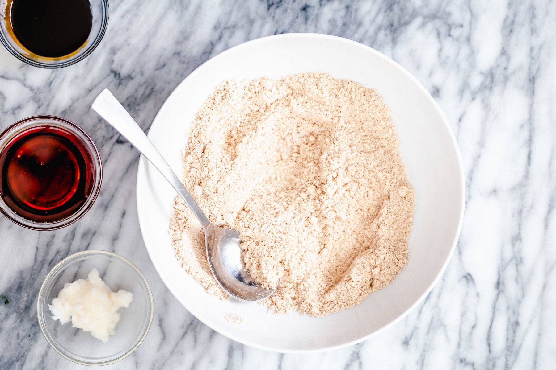 vegan gingerbread cookies vegan gingerbread cookie batter mix in a small white bowl