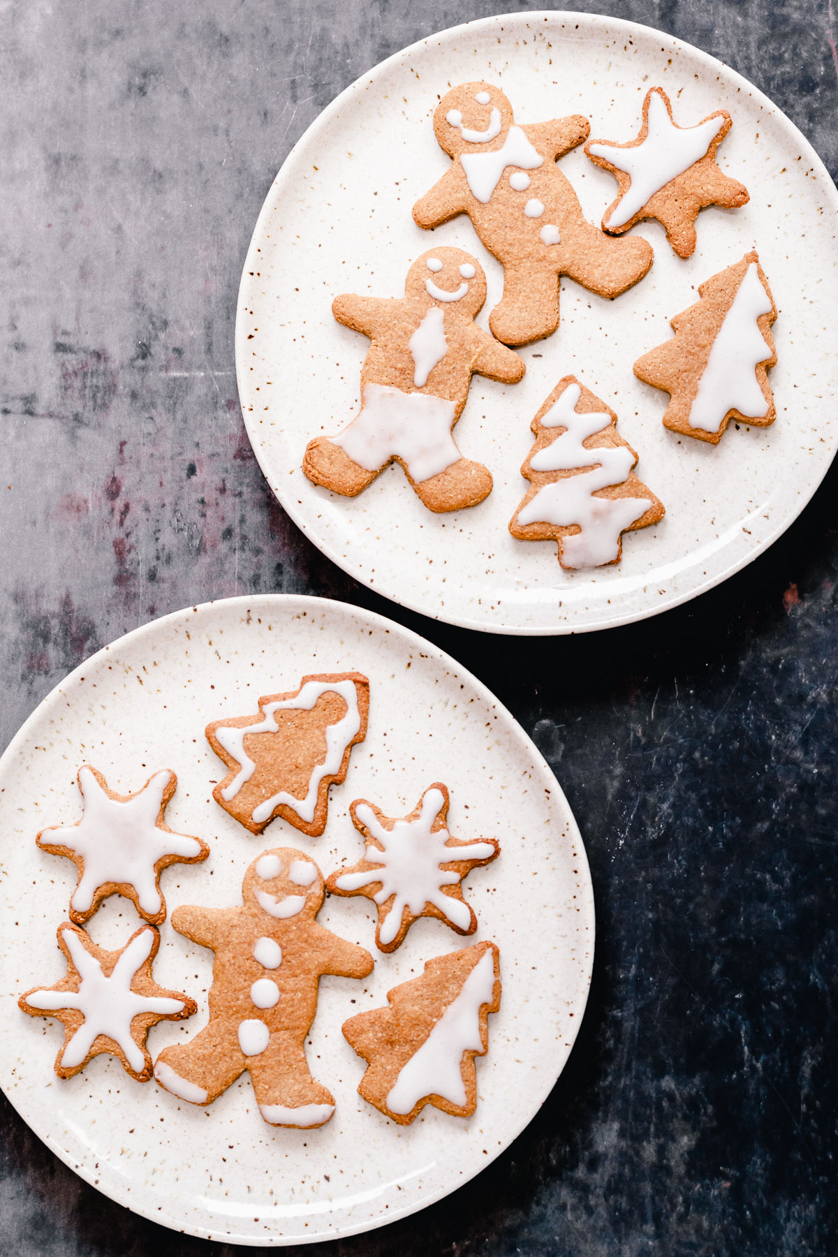 vegan gingerbread cookies overhead shot of iced vegan gingerbread cookies
