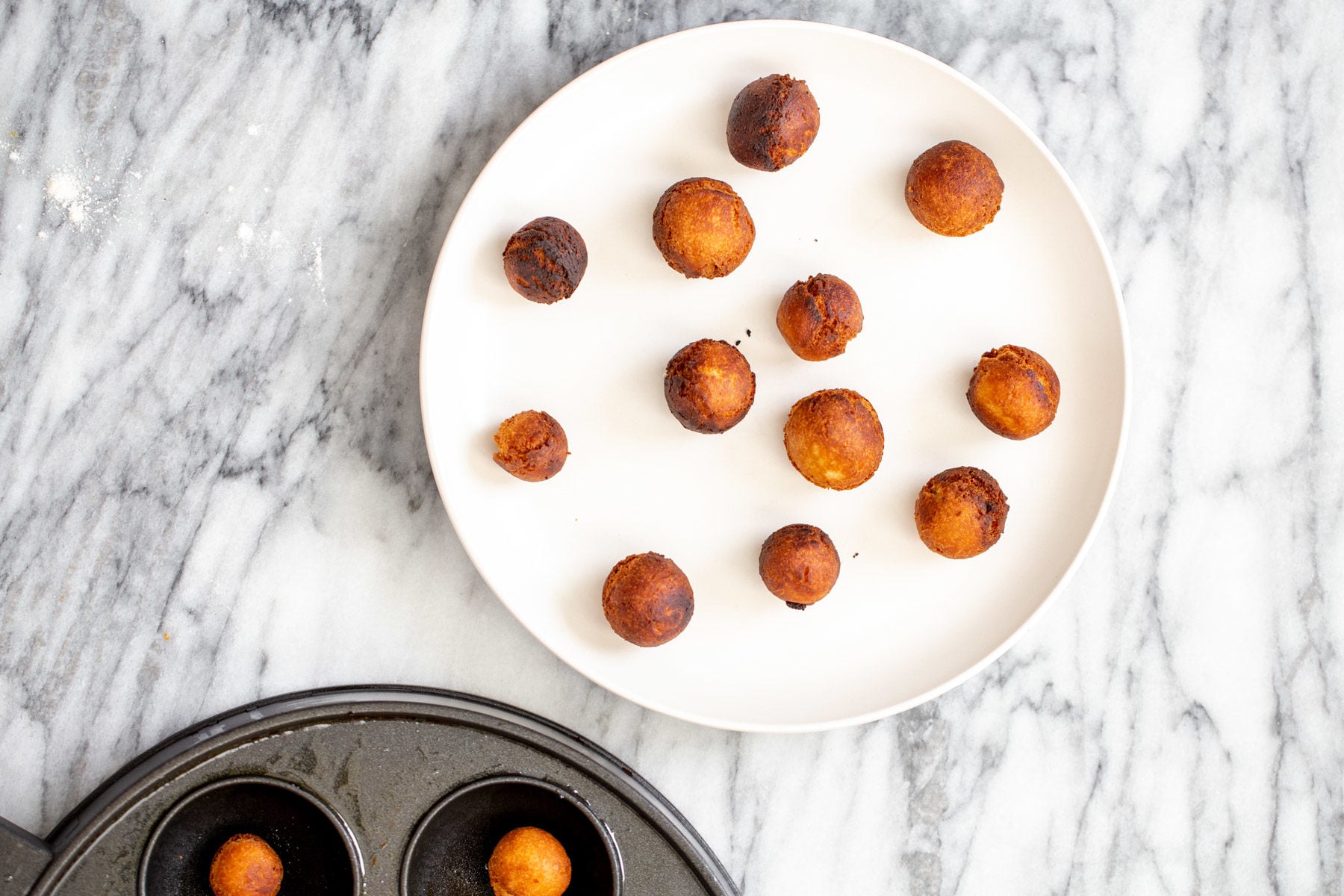 vegan gulab jamun vegan gulab jamun on a white plate