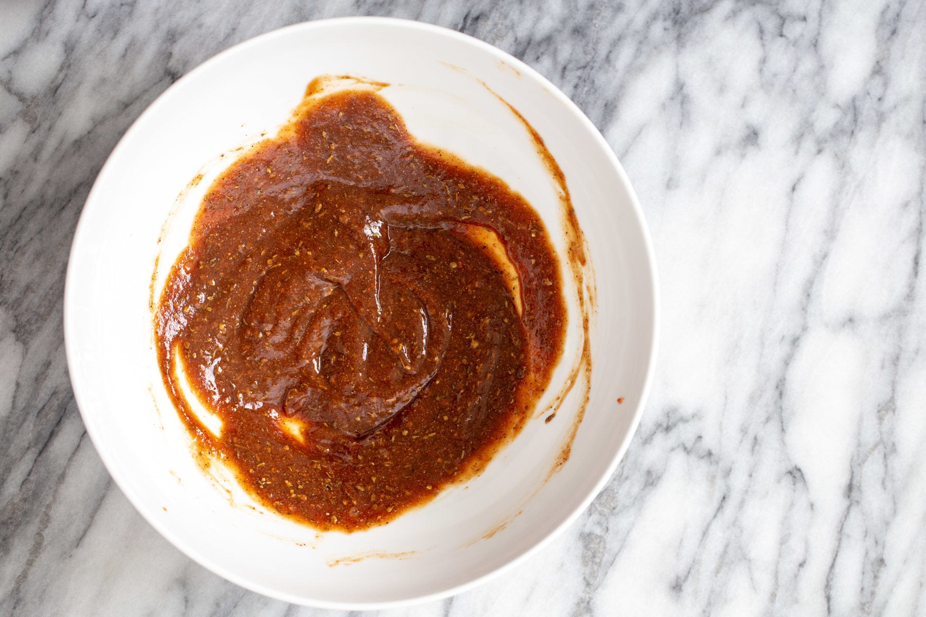 cheeseburger sauce being mixed in a small bowl 