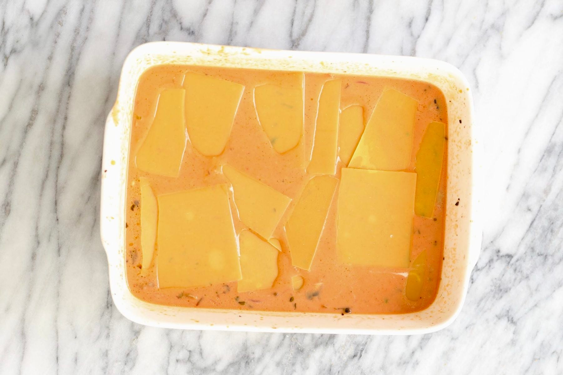 vegan butter chicken lasagna ready to be baked