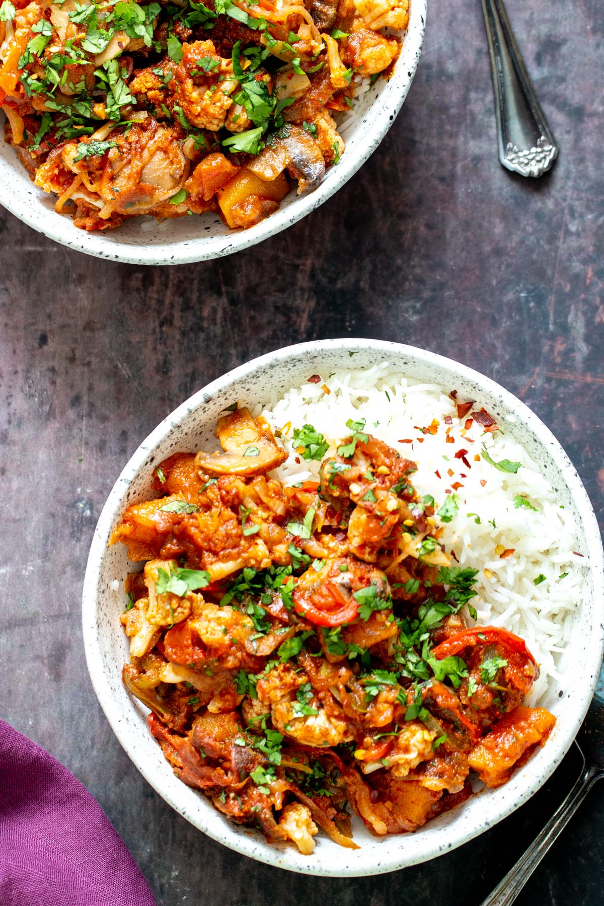 vegetable balti two bowls of healthy vegetable balti with rice