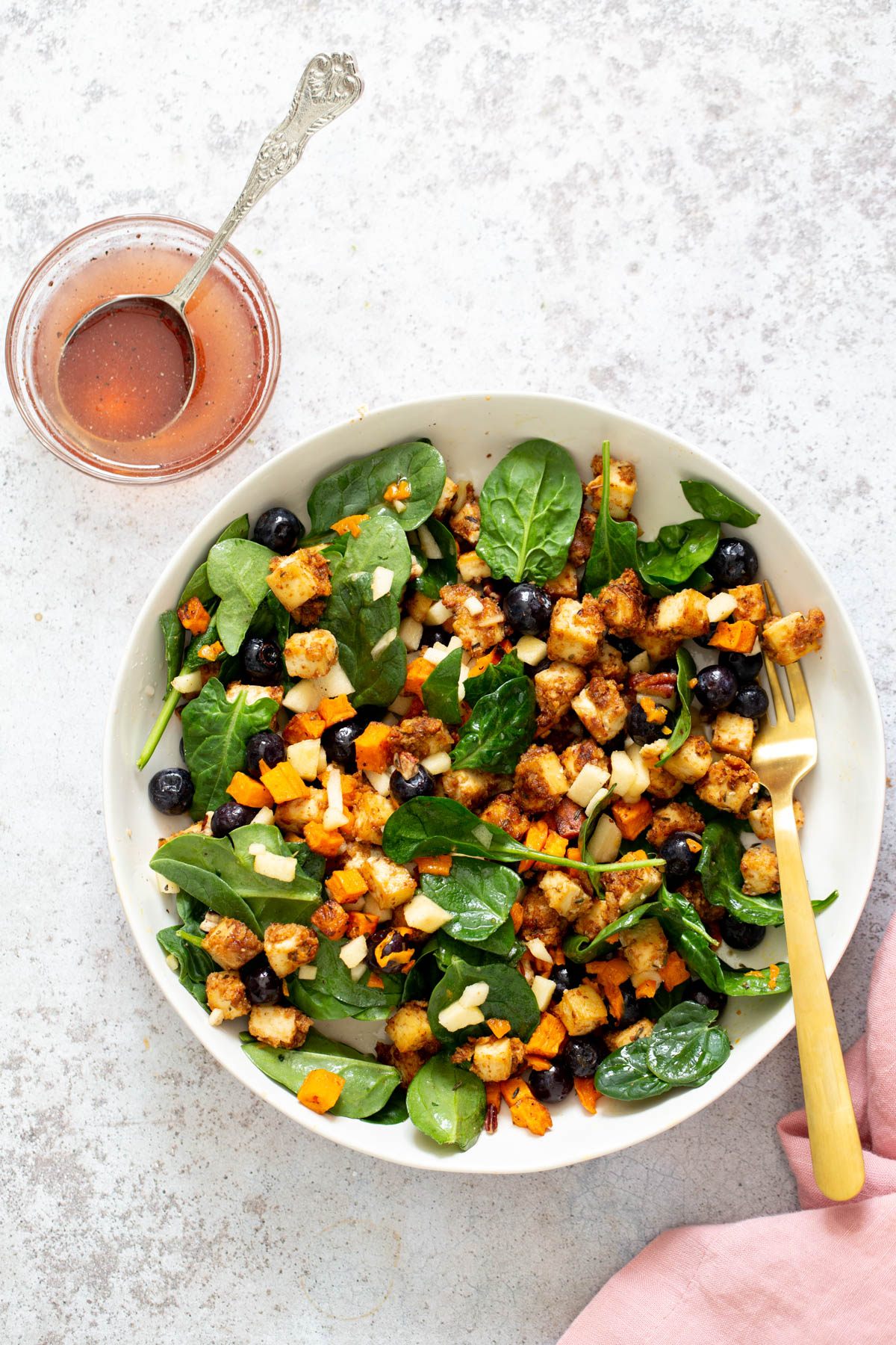 sweet potato tofu bowl sweet potato tofu bowls with blueberries and chunks of apple tossed in a shallow white bowl with maple mustard dressing