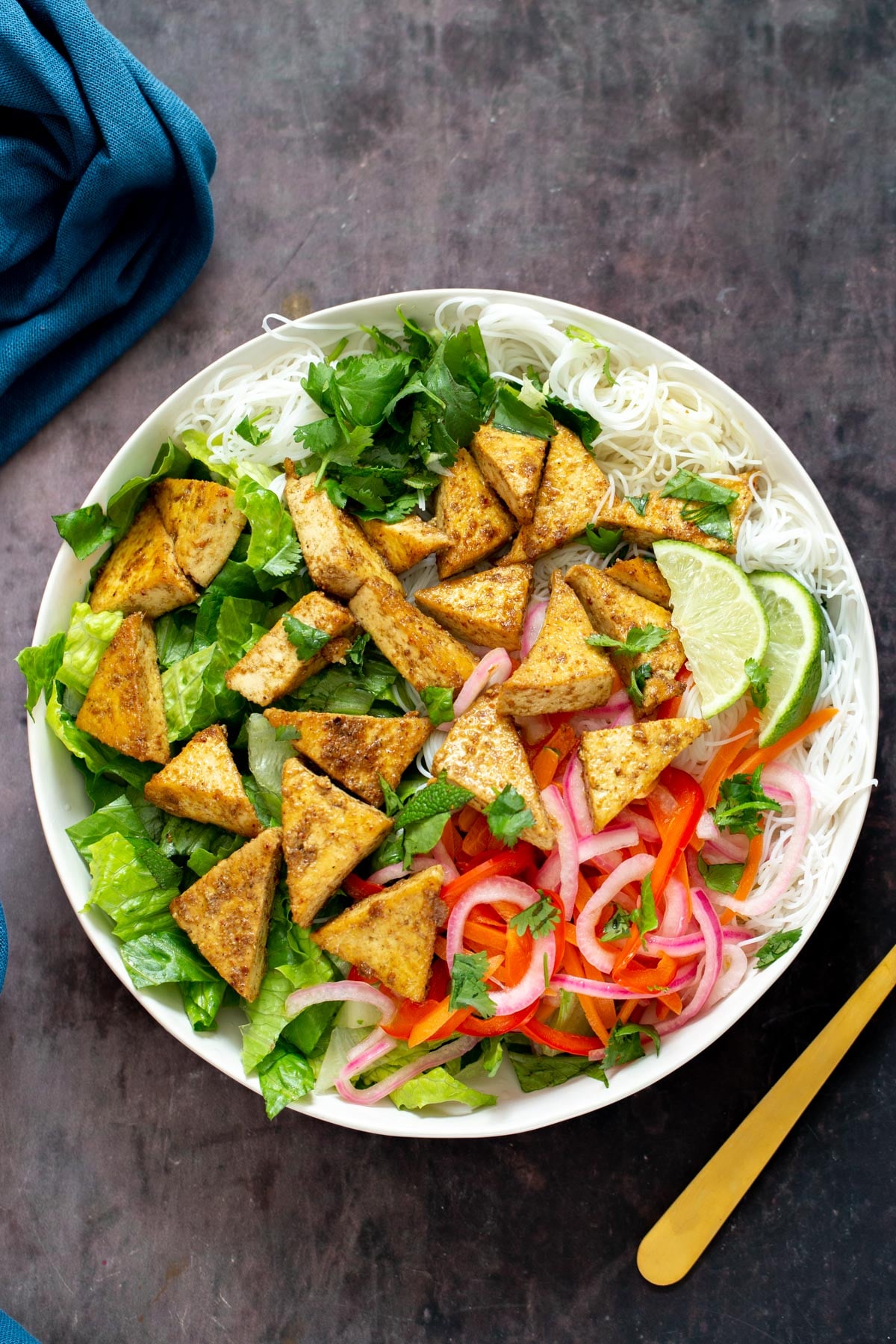 tofu noodle bowls overhead shot of Vietnamese curried noodle bowls decorated with fresh herbs