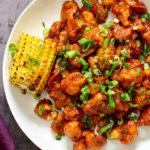 beer battered baked bbq wings covered with bbq sauce
