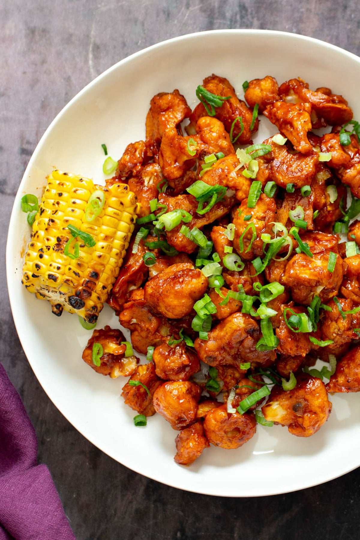 cauliflower wings beer battered bbq cauliflower wings served with a piece of grilled corn on the cob