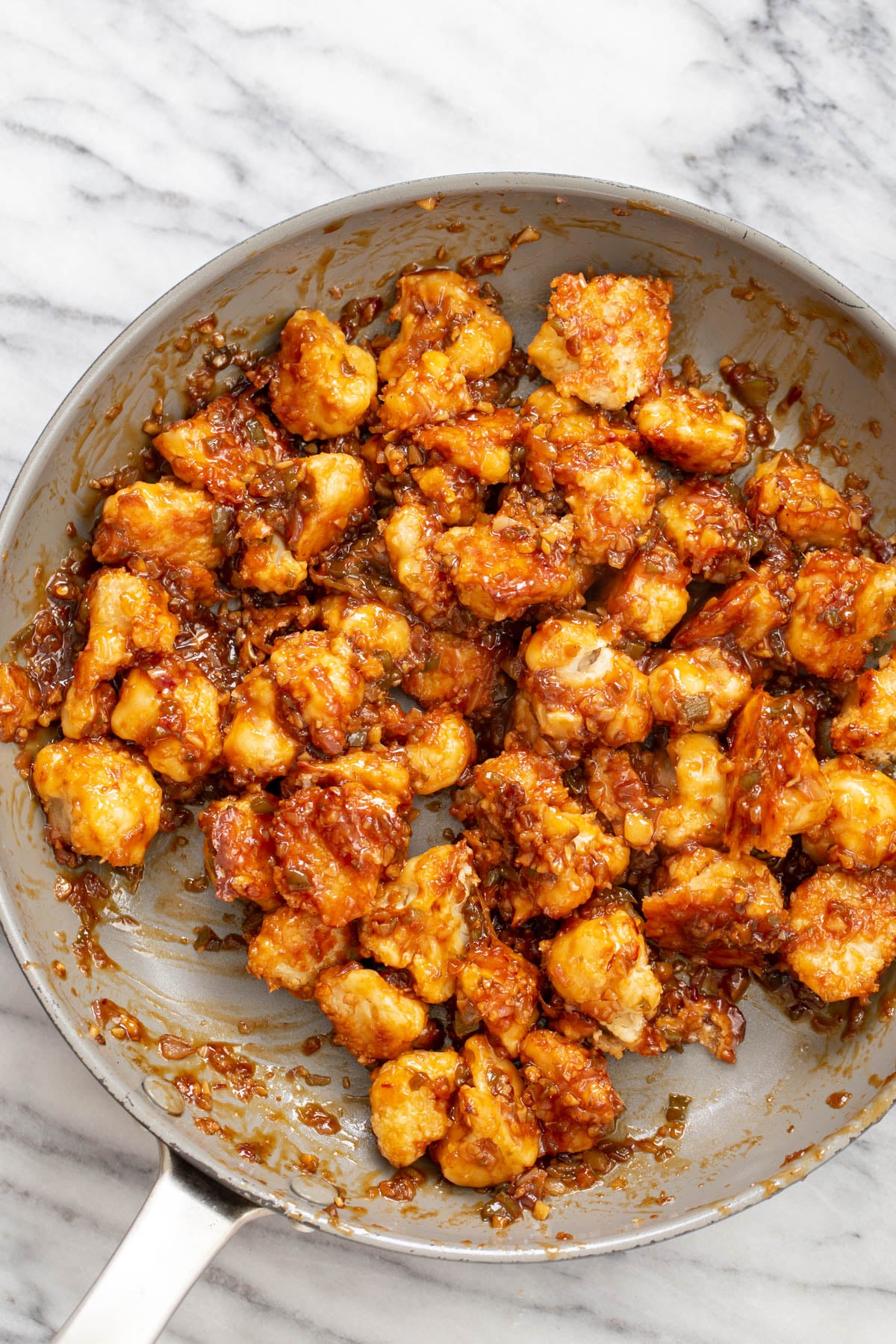 cauliflower manchurian vegan cauliflower manchurian in a saucepan