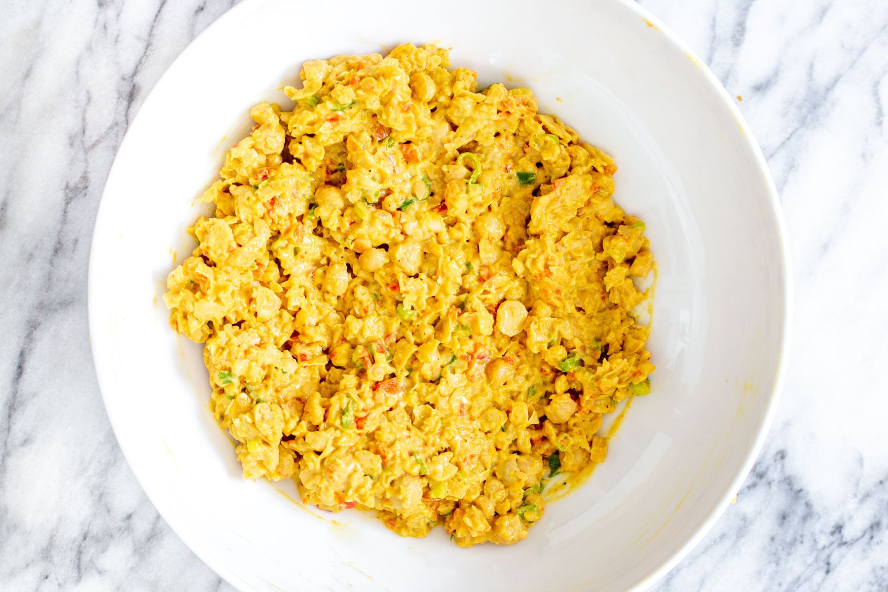 vegan chickpea scramble in a white bowl 