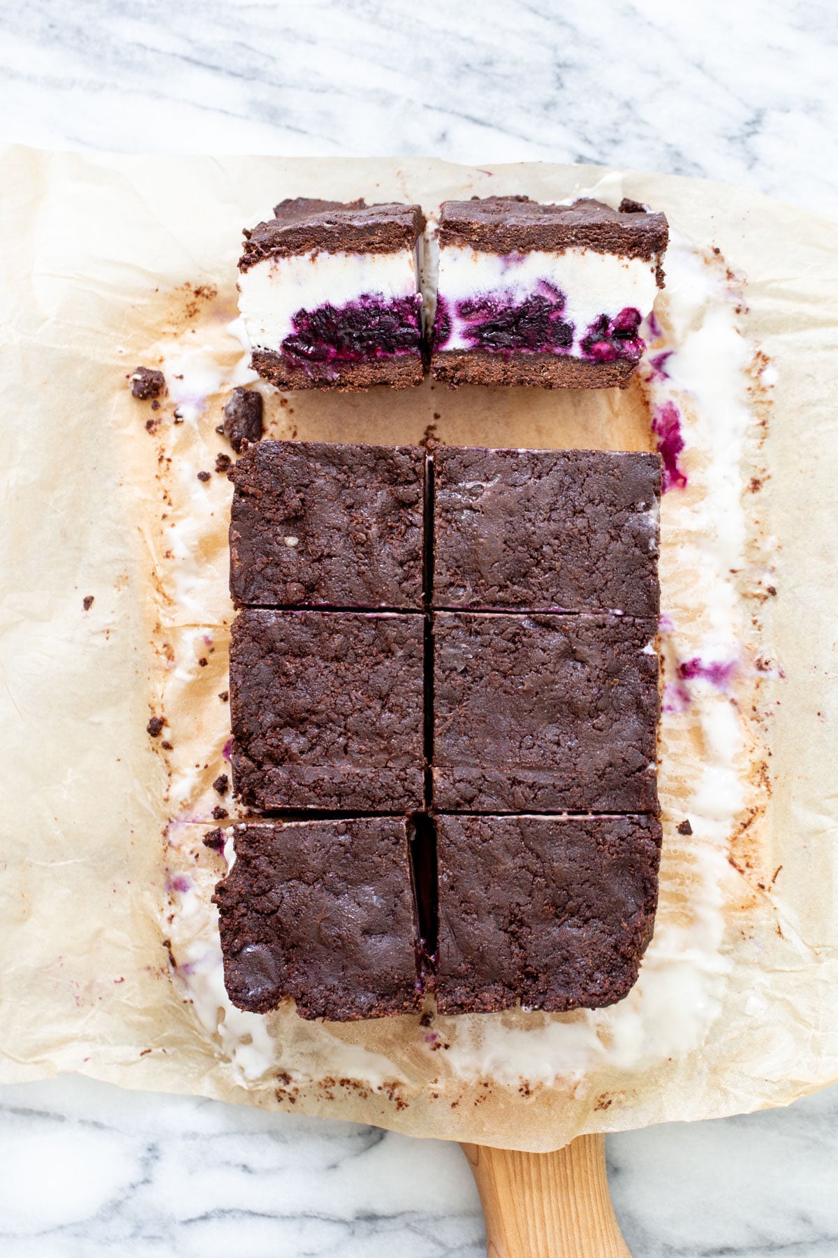 vegan vanilla ice cream sandwiches being cut into squares
