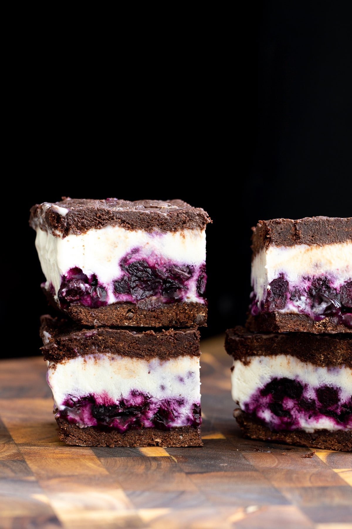 vanilla ice cream sandwiches vegan vanilla blueberry swirl ice cream sandwiches on a chopping board