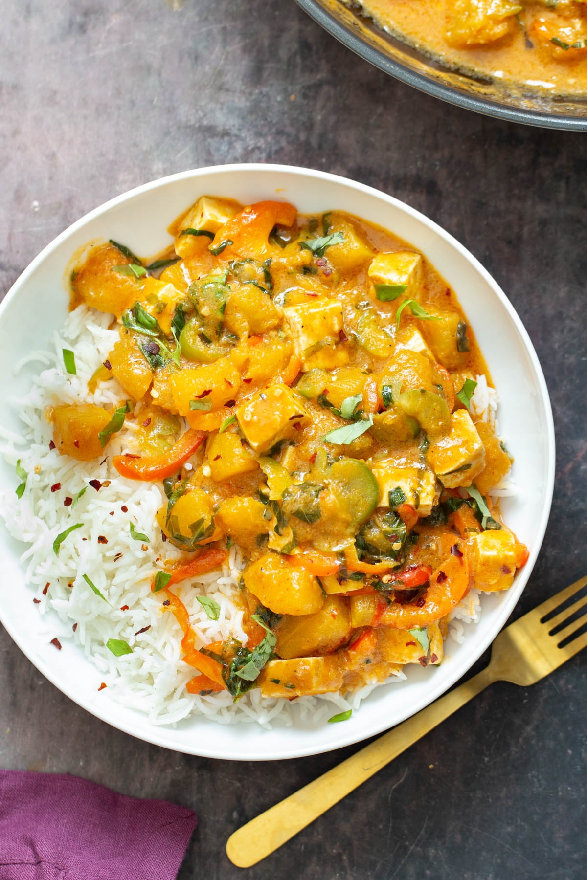 vegan pumpkin curry vegan pumpkin curry with tofu served with a side of rice