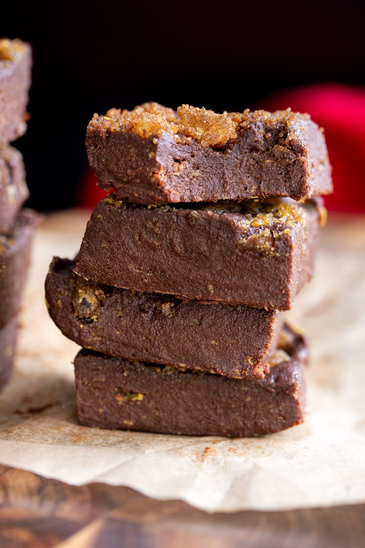 vegan gingerbread fudge a stack of vegan gingerbread fudge topped with candied ginger and brown sugar