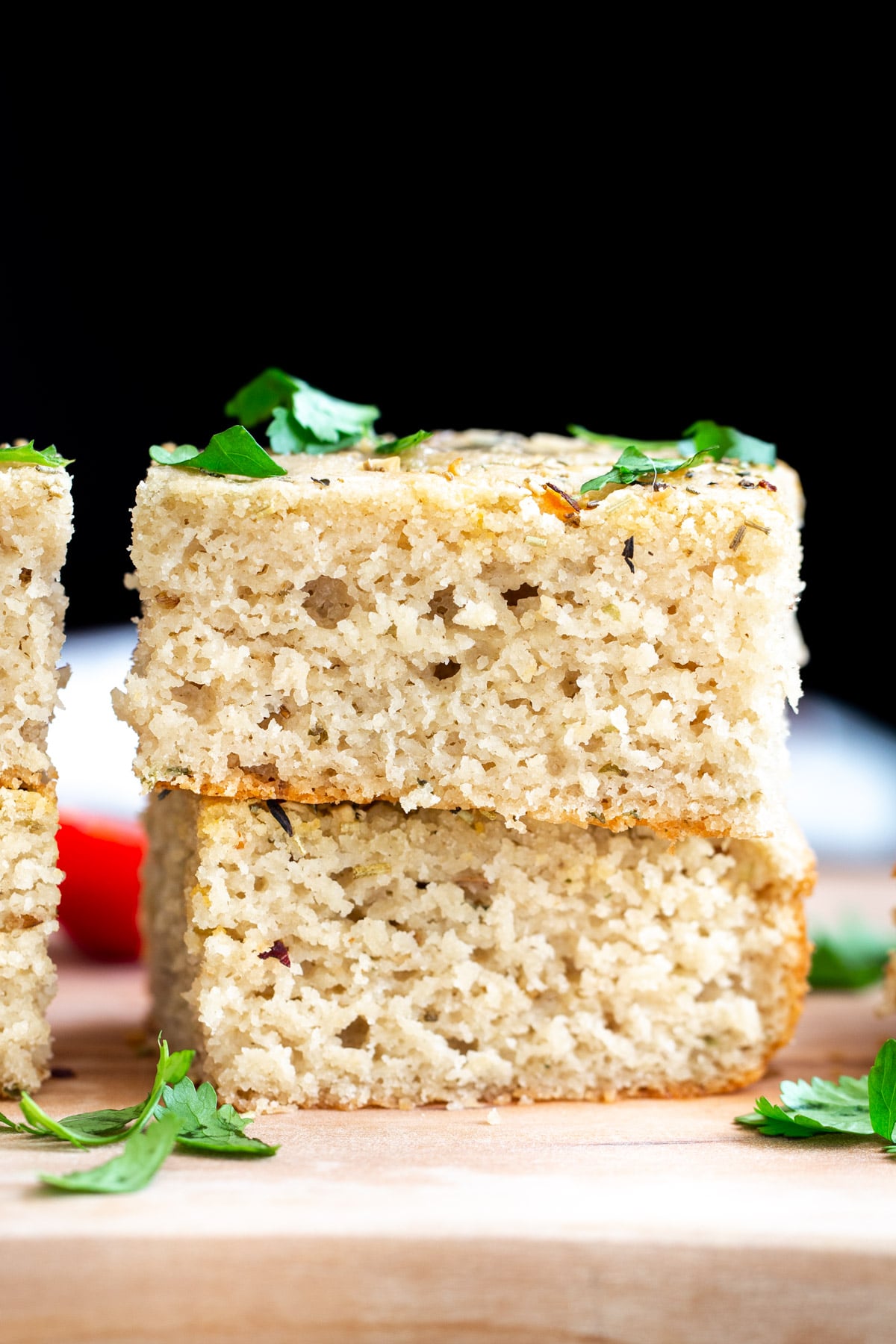 glutenfree focaccia stacked slices of vegan glutenfree focaccia bread on a wooden board