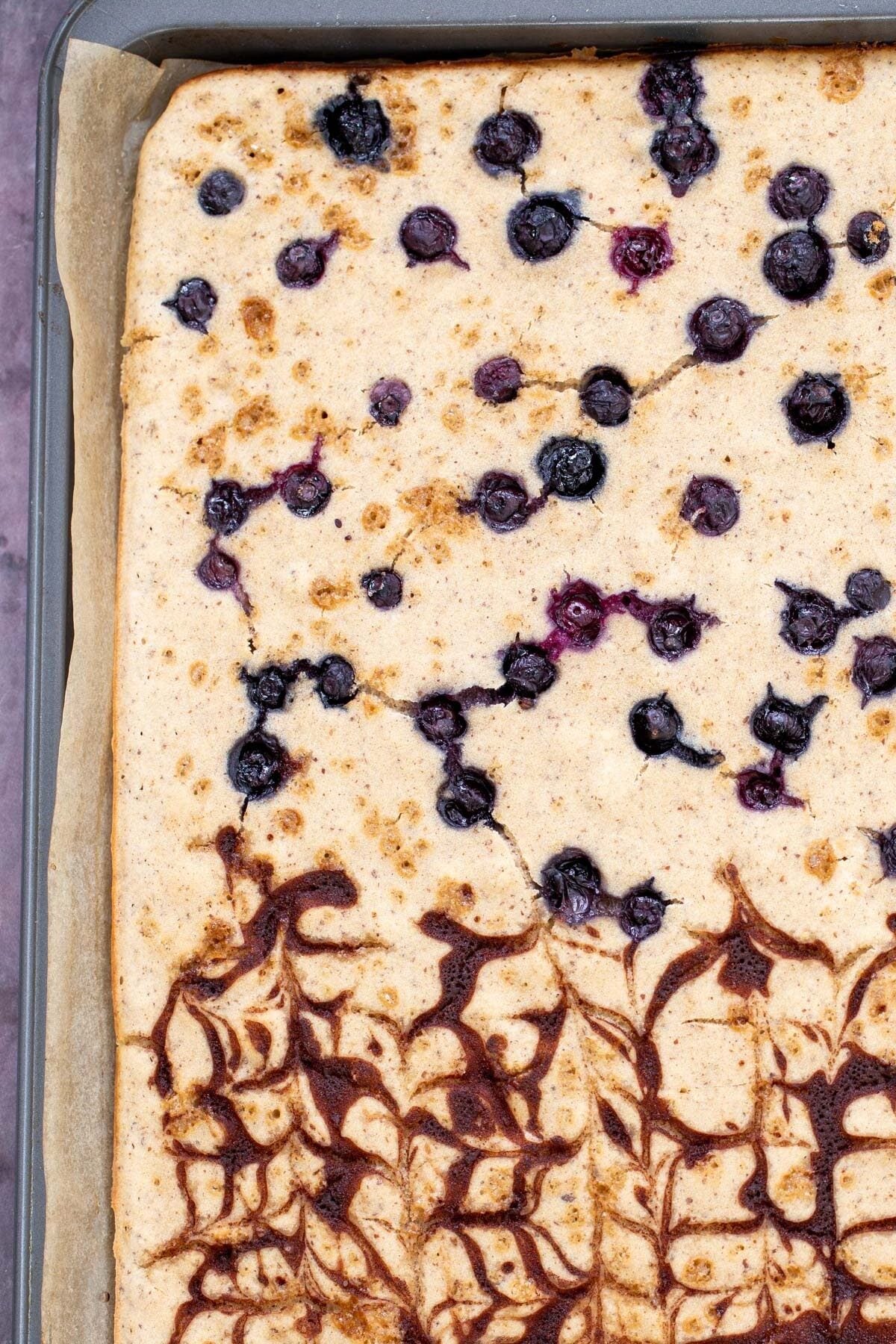 vegan sheet pan pancakes freshly baked vegan sheet pan pancakes with cinnamon swirl and blueberries
