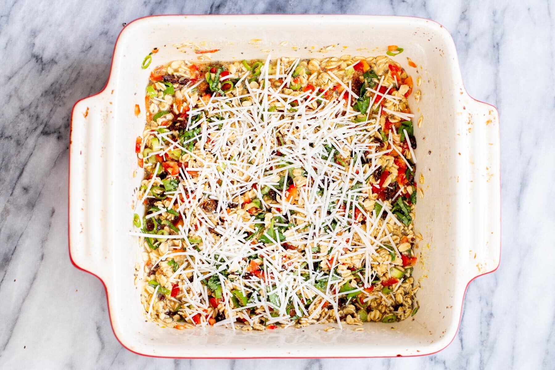 savory oatmeal bake pizza baked oatmeal topped with shredded vegan mozarella