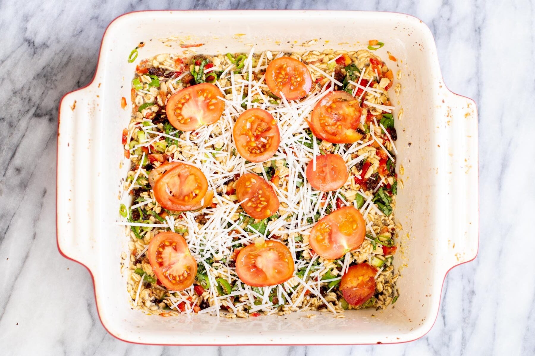 savory oatmeal bake savory oatmeal bake topped with shredded mozarella and tomatoes