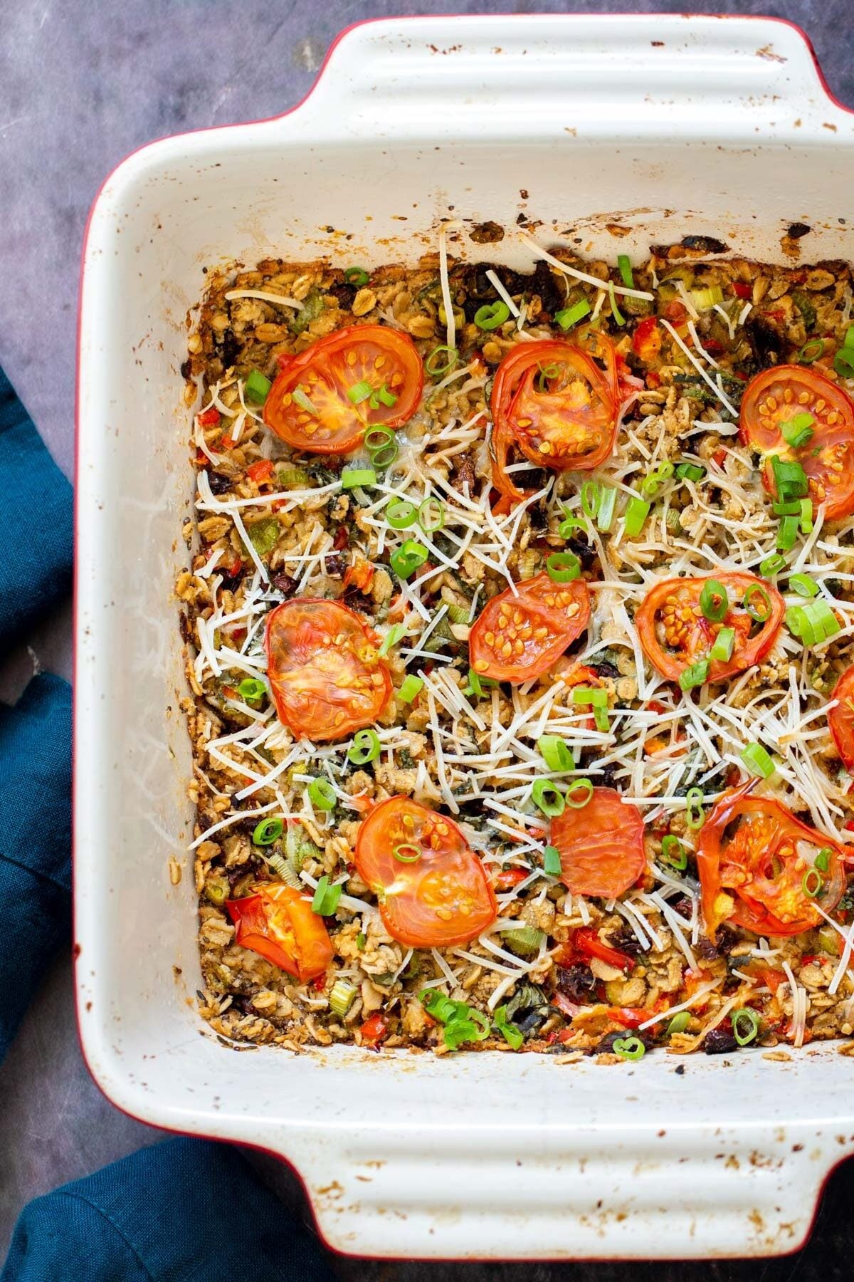 pizza oatmeal bake in a white casserole dish