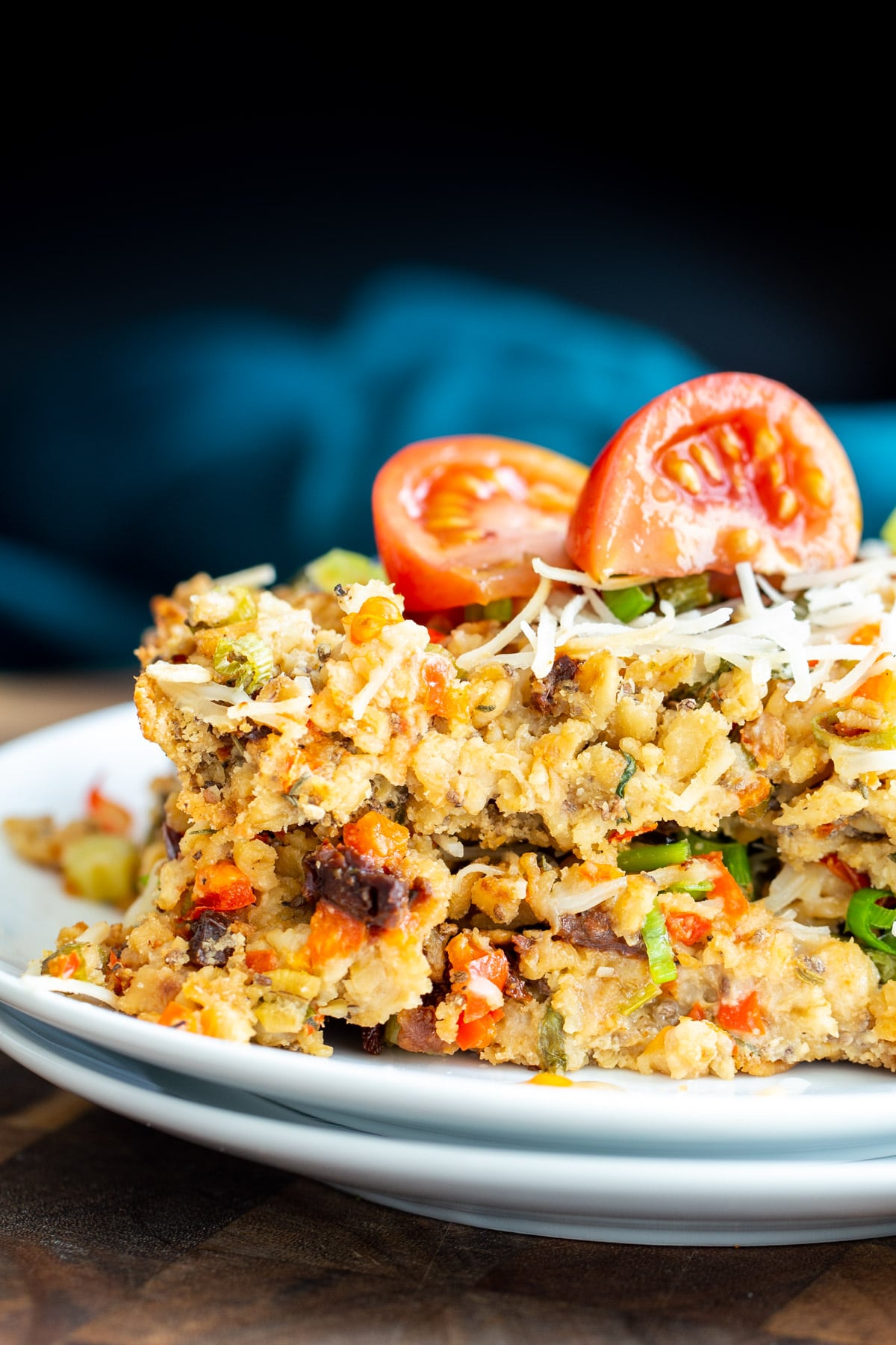 savory oatmeal bake a slice of savory pizza oatmeal bake topped with vegan mozzarella and tomatoes