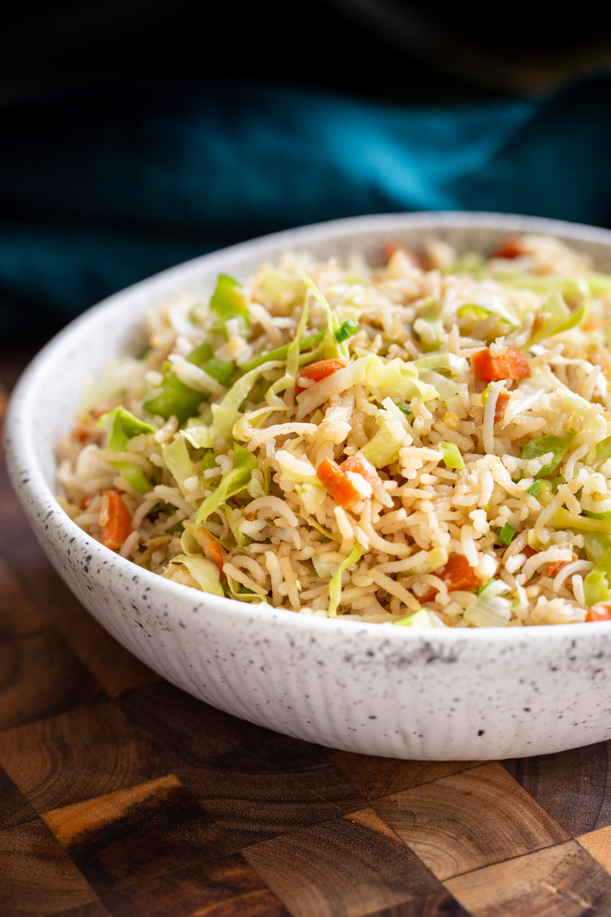 Indo Chinese fried rice side view of a bowl of Indo Chinese Fried rice