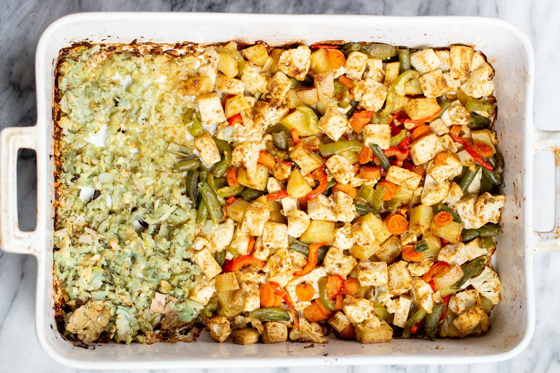 minced ginger and garlic in a white casserole dish