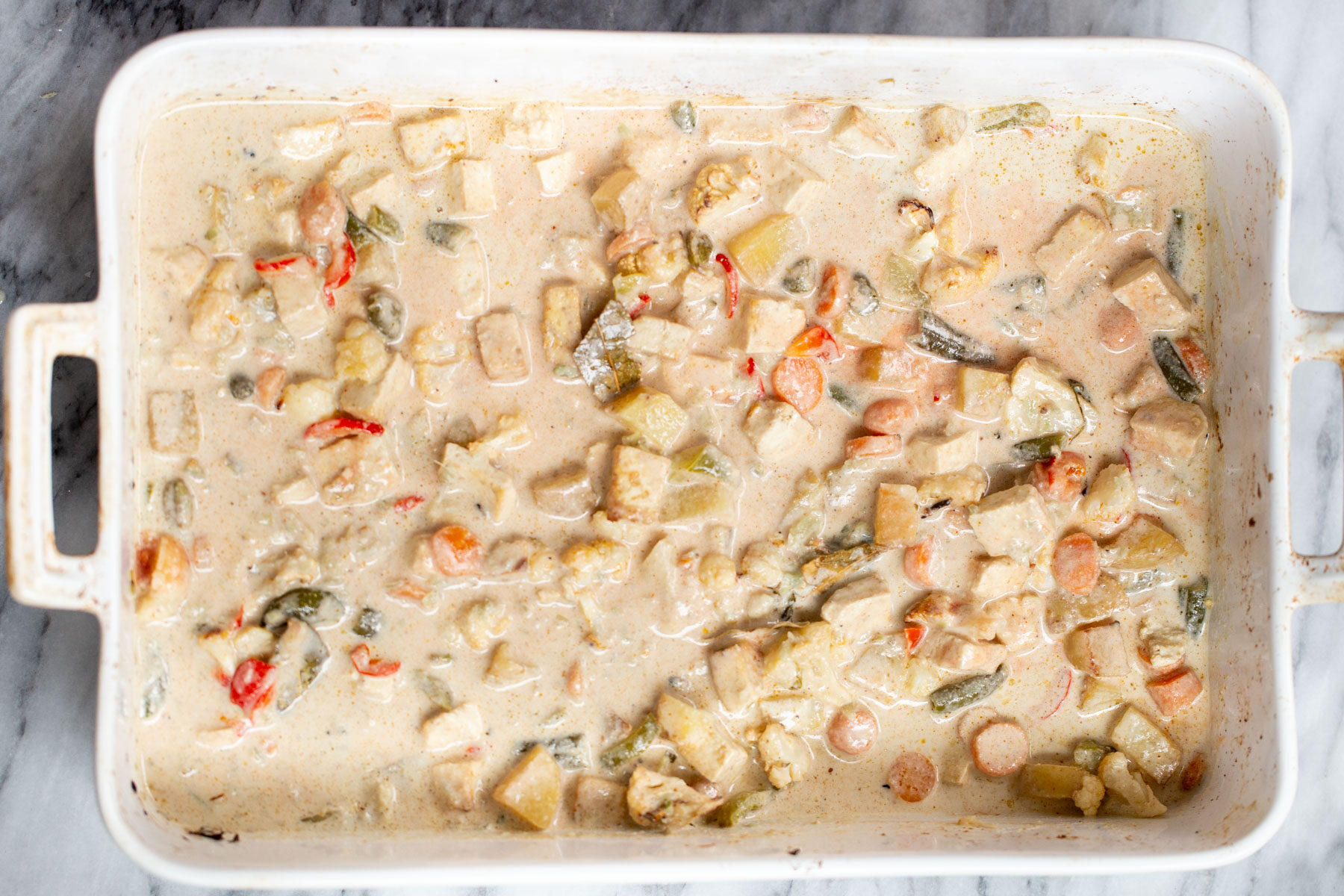 Navratan Korma Navratan Korma in a white casserole dish