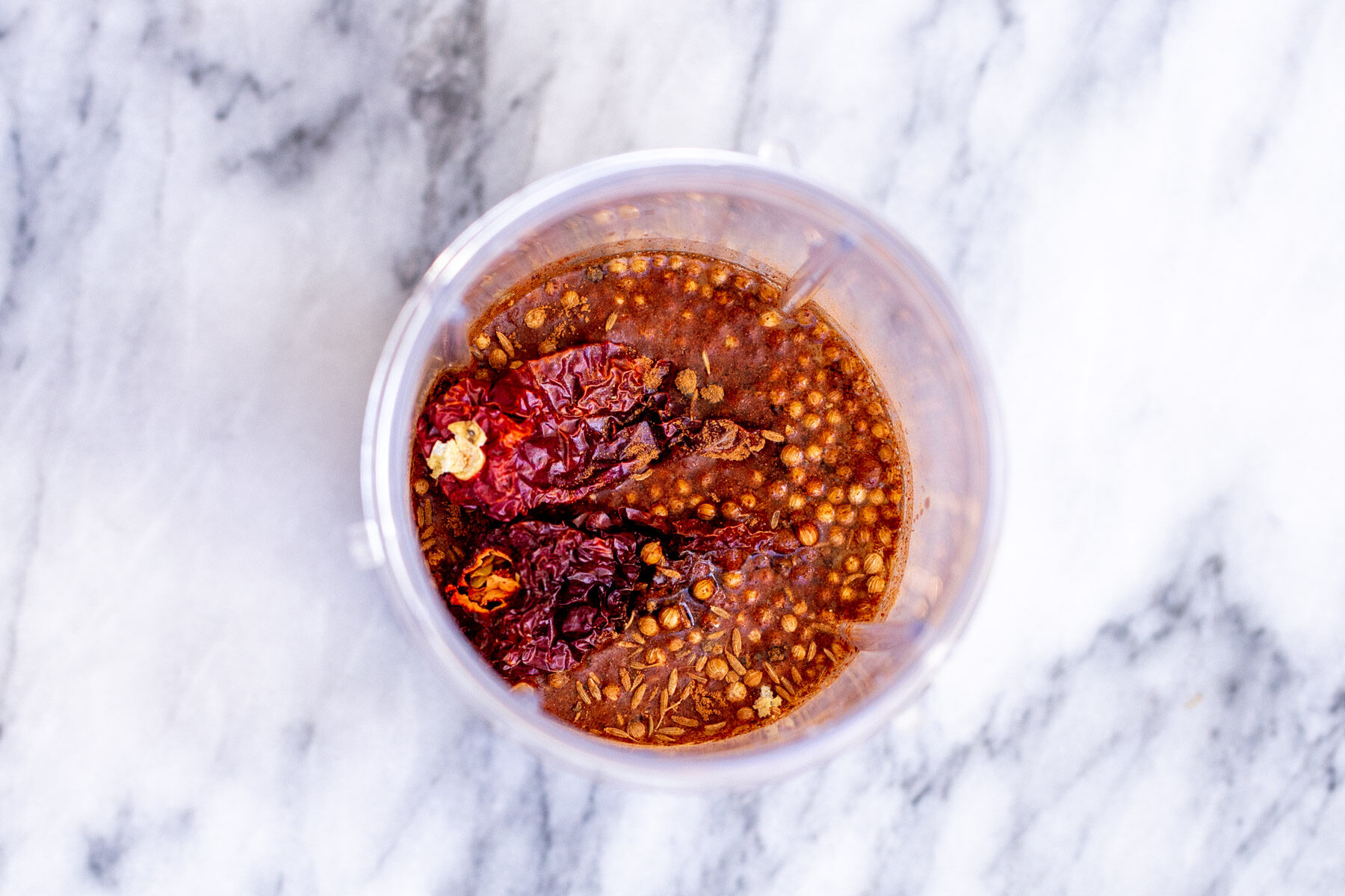ingredients for vindaloo chili paste in a small container