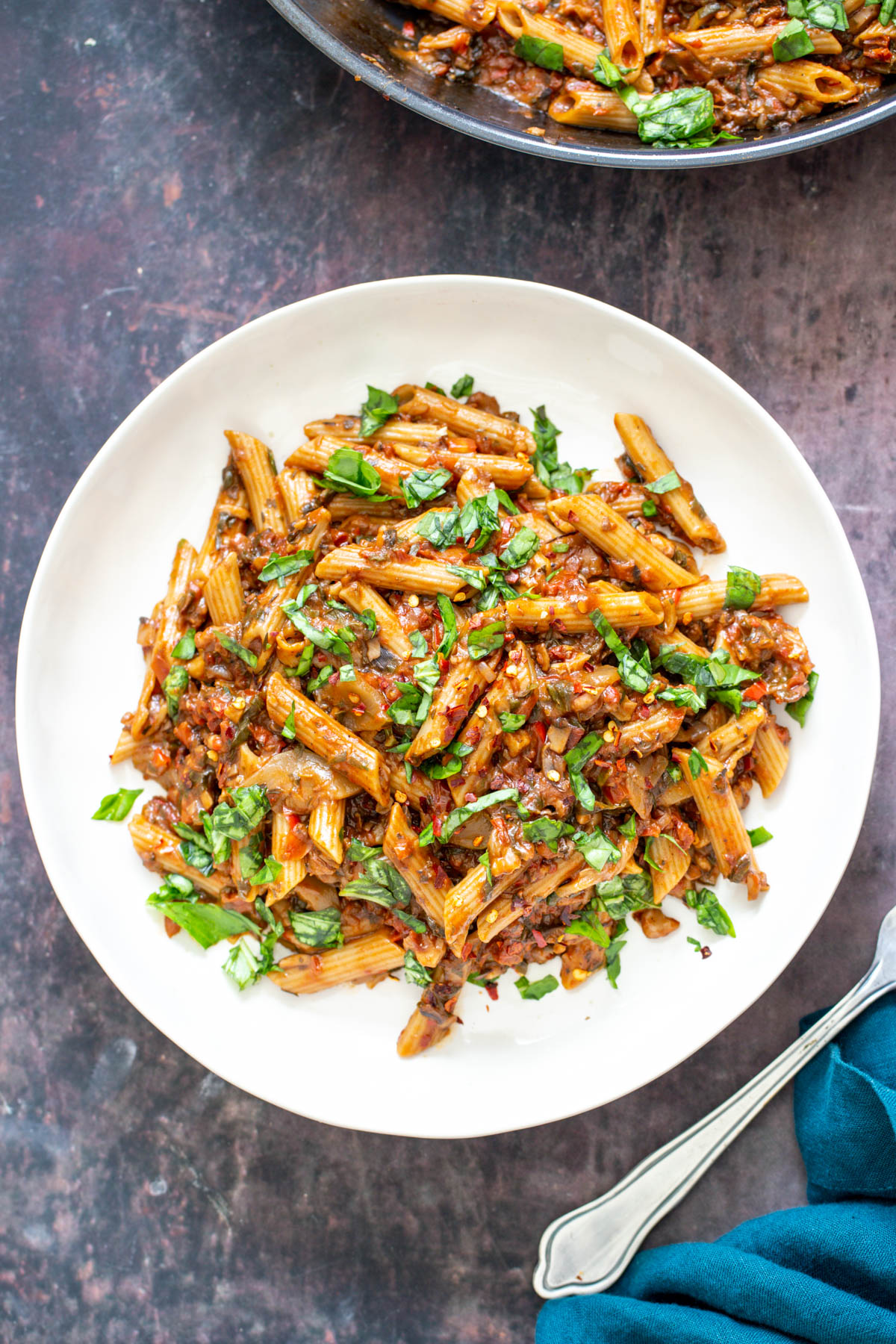 plate with veggie pasta in vegetable sauce