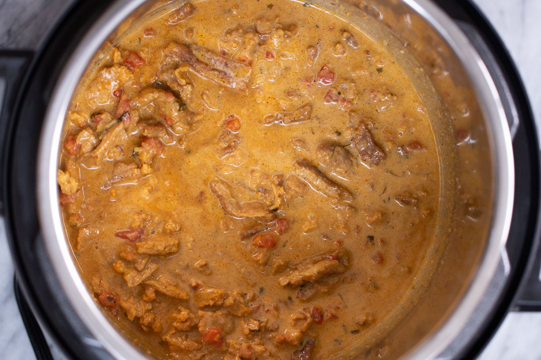 overhead shot of an Instant Pot with soycurl curry