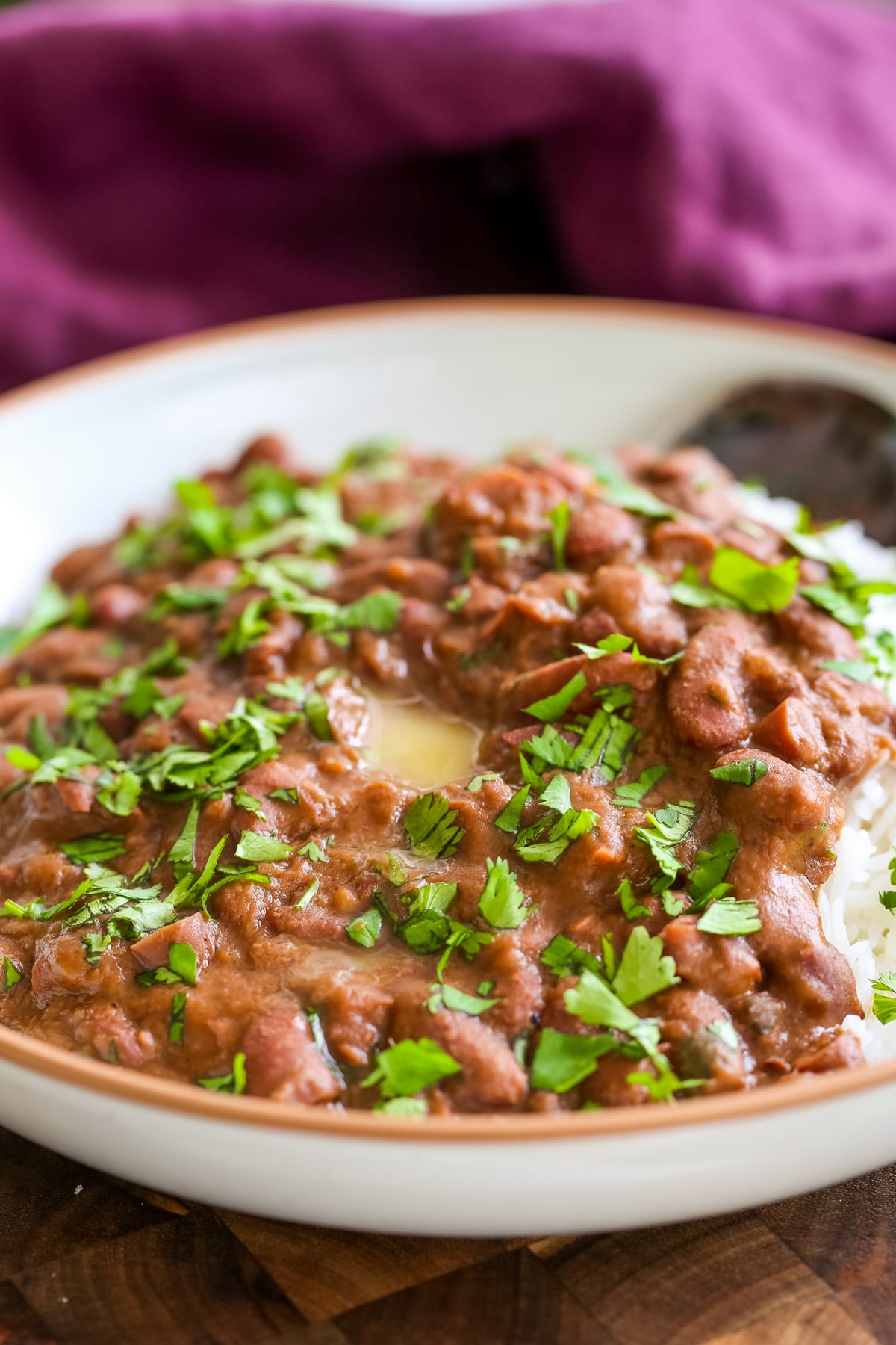 Dhaba Style Rajma Recipe a plate of Dhaba Style Rajma with rice sprinkled with cilantro