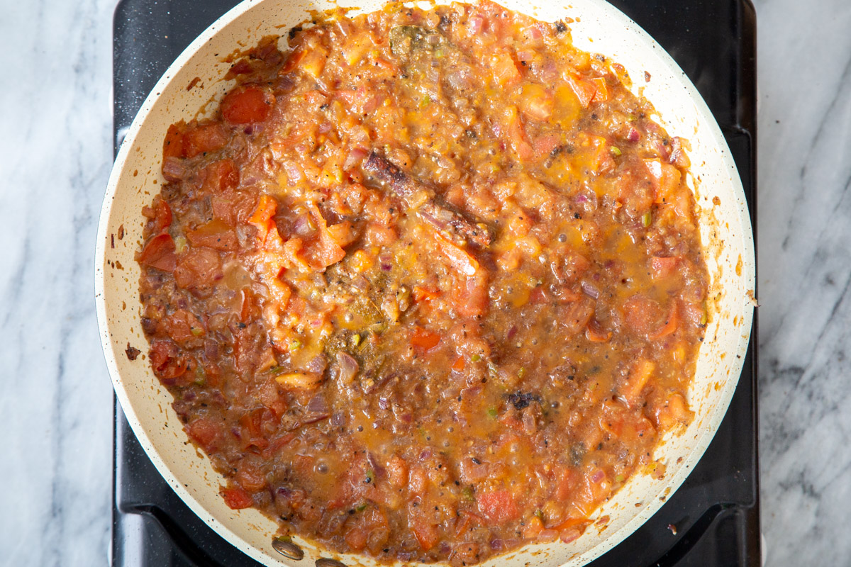 Indian tomato gravy in a frying pan