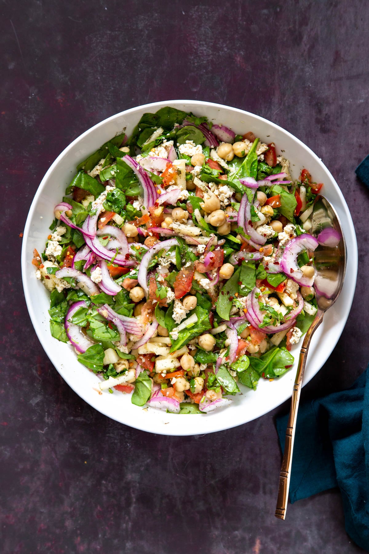 a bowl with healthy chickpea salad with lemon dill dressing