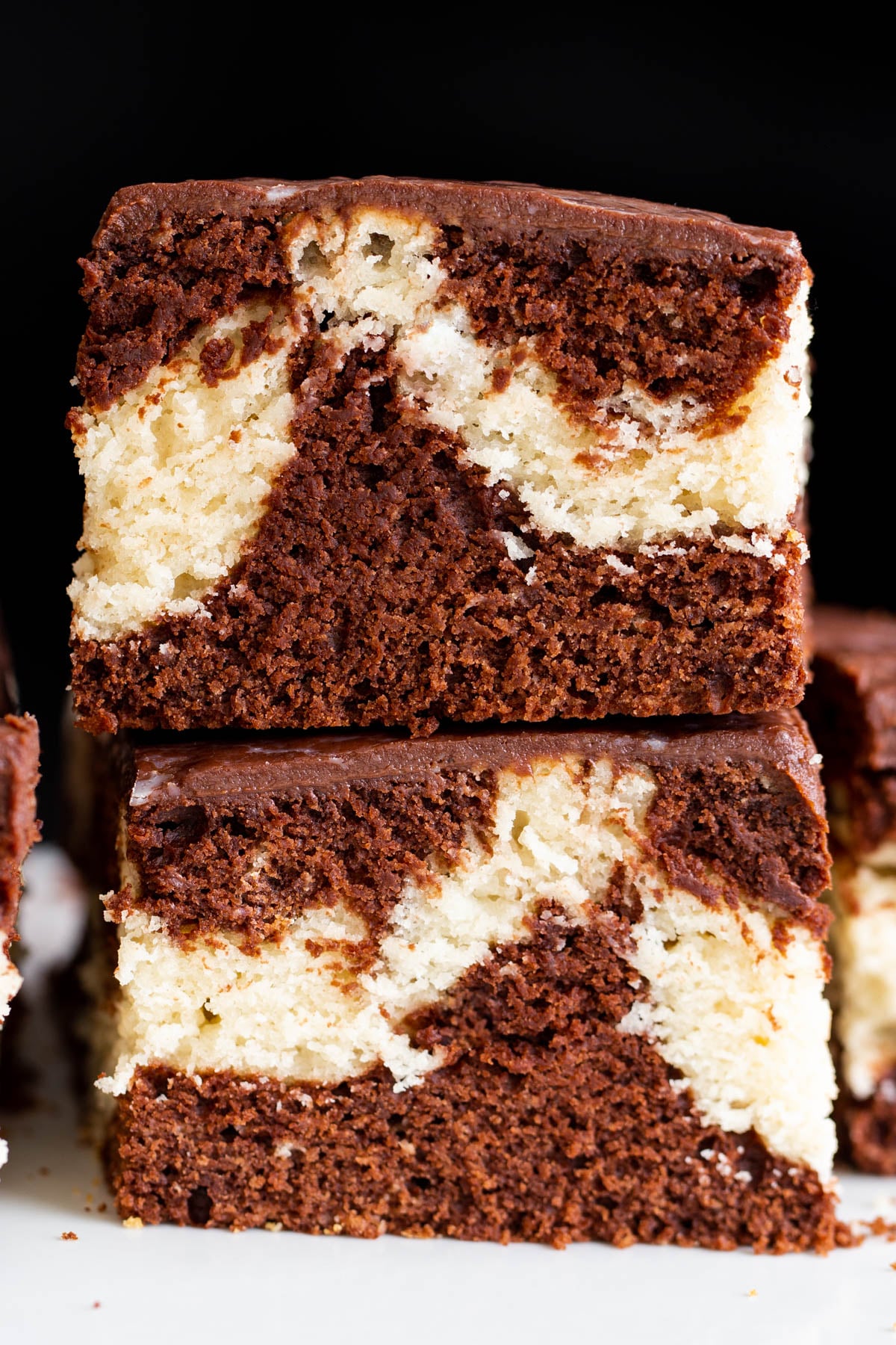 two stacked squares of vegan mocha marble cake