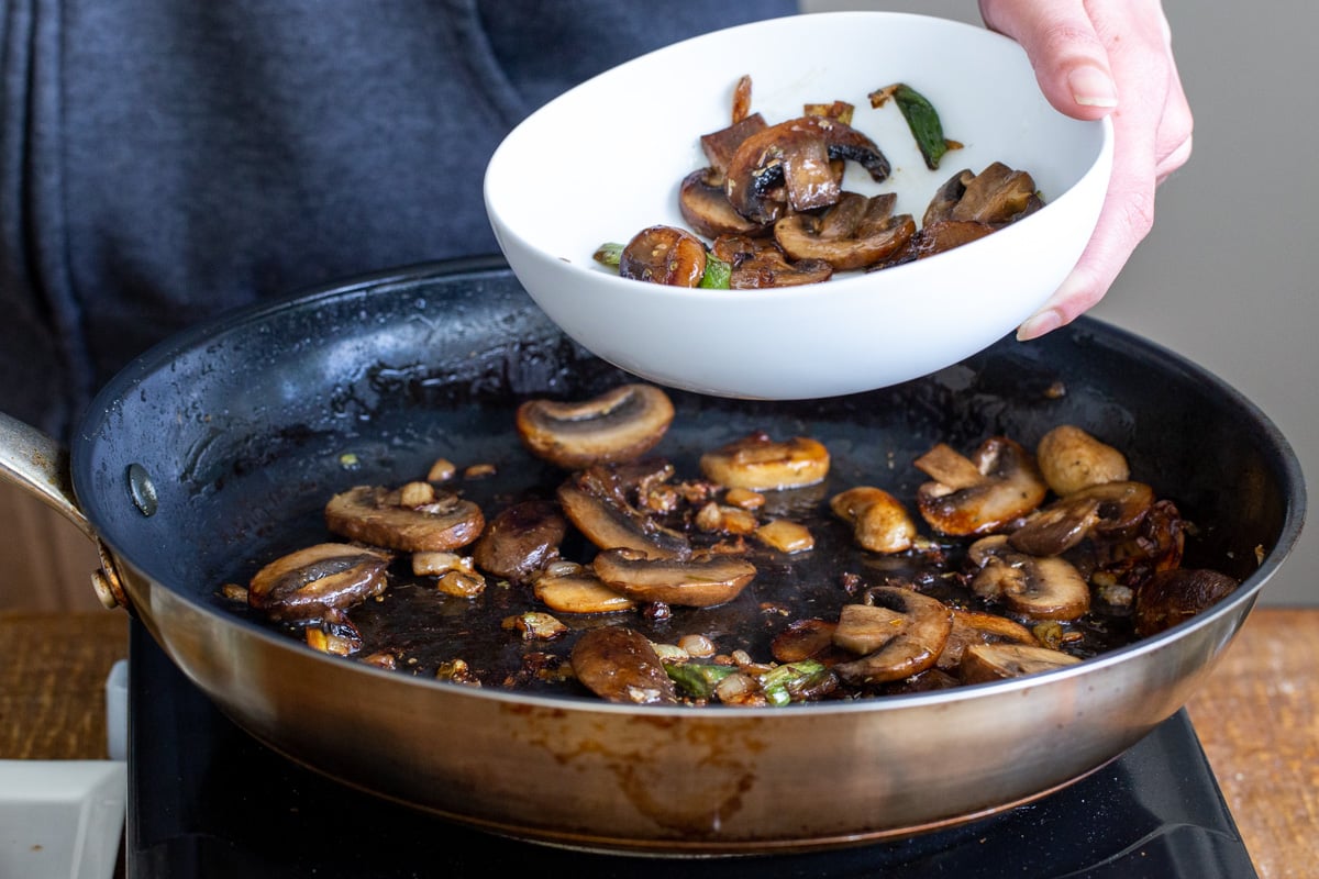 golden brown fried mushrooms in a skillet