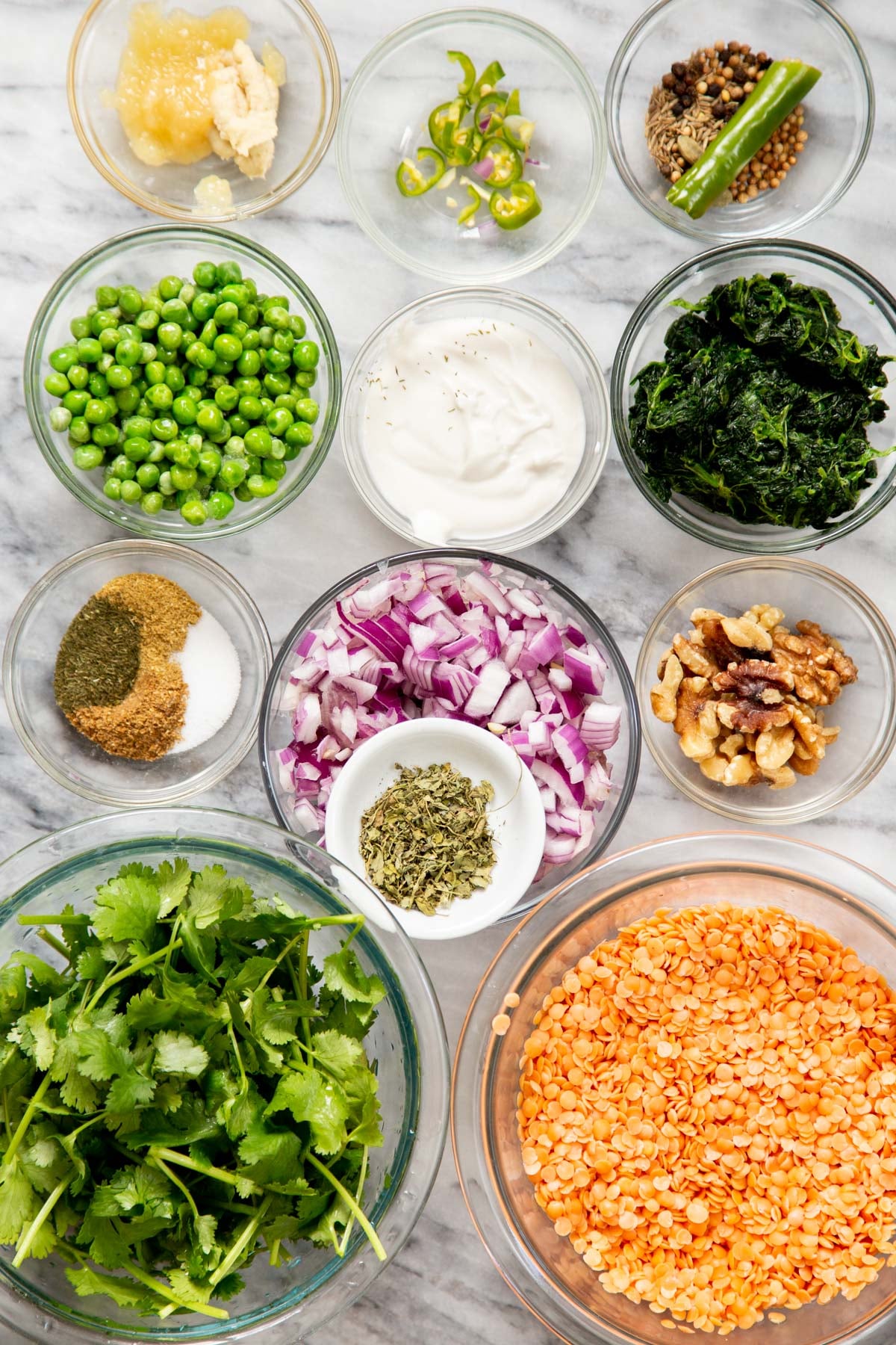 ingredients for vegan green keema on a marble countertop