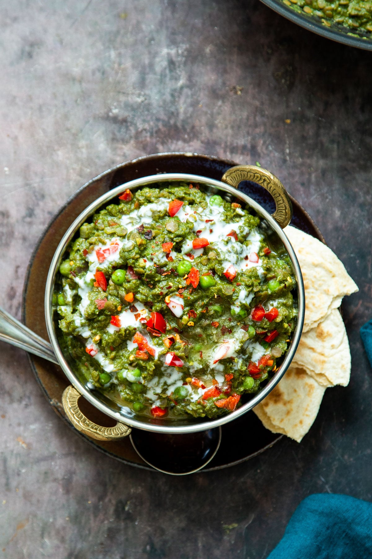 a traditional Indian dish with vegan green keema served with a side of flatbread