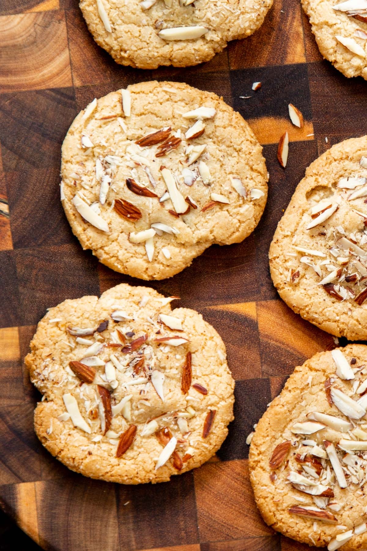 glutenfree almond joy cookies on a wooden chopping board 