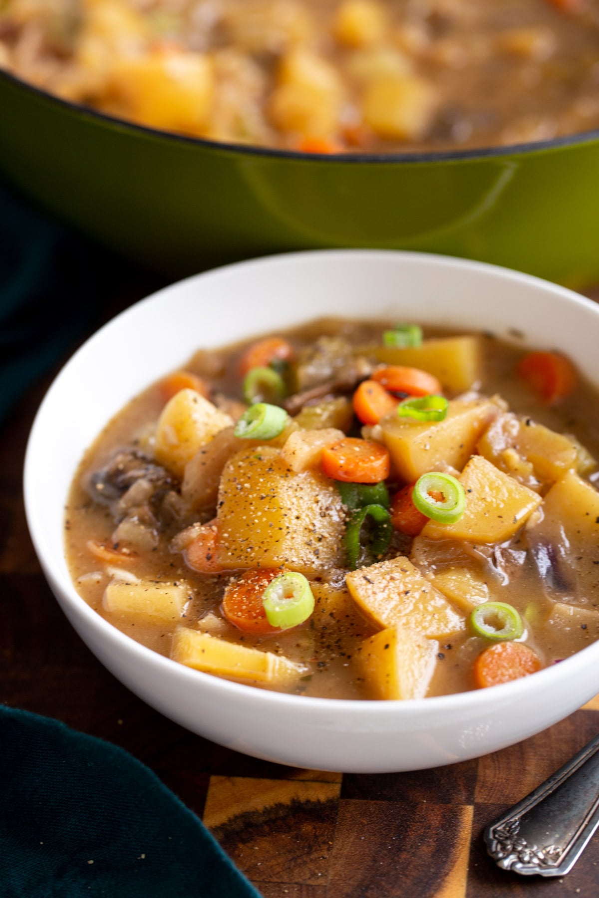 a bowl of vegan irish stew in a soup bowl 