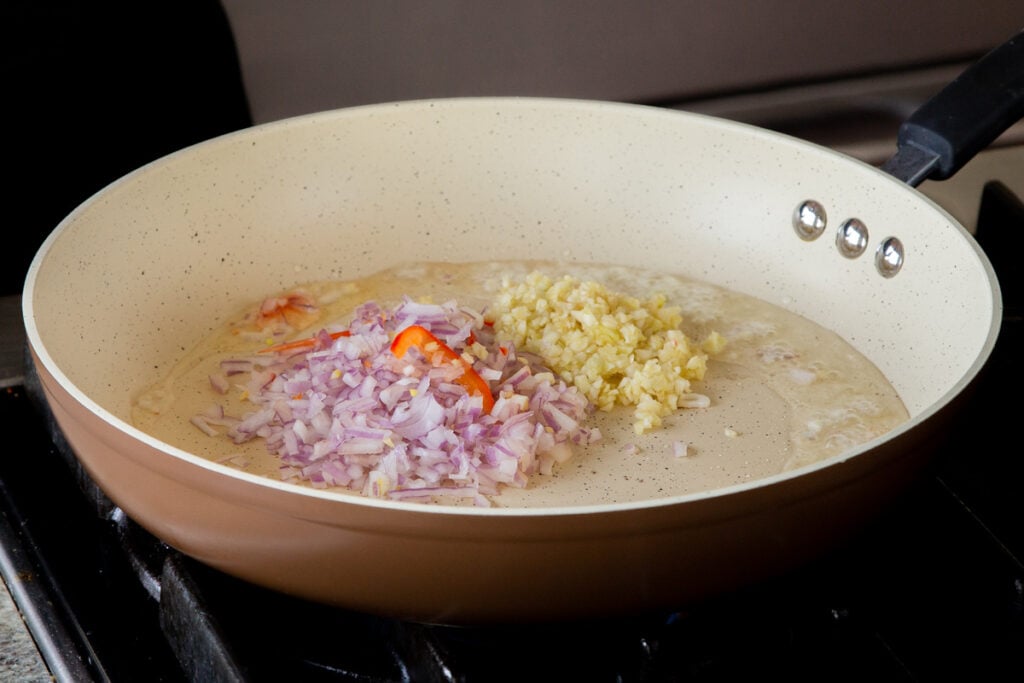 sautéing the garlic and onion