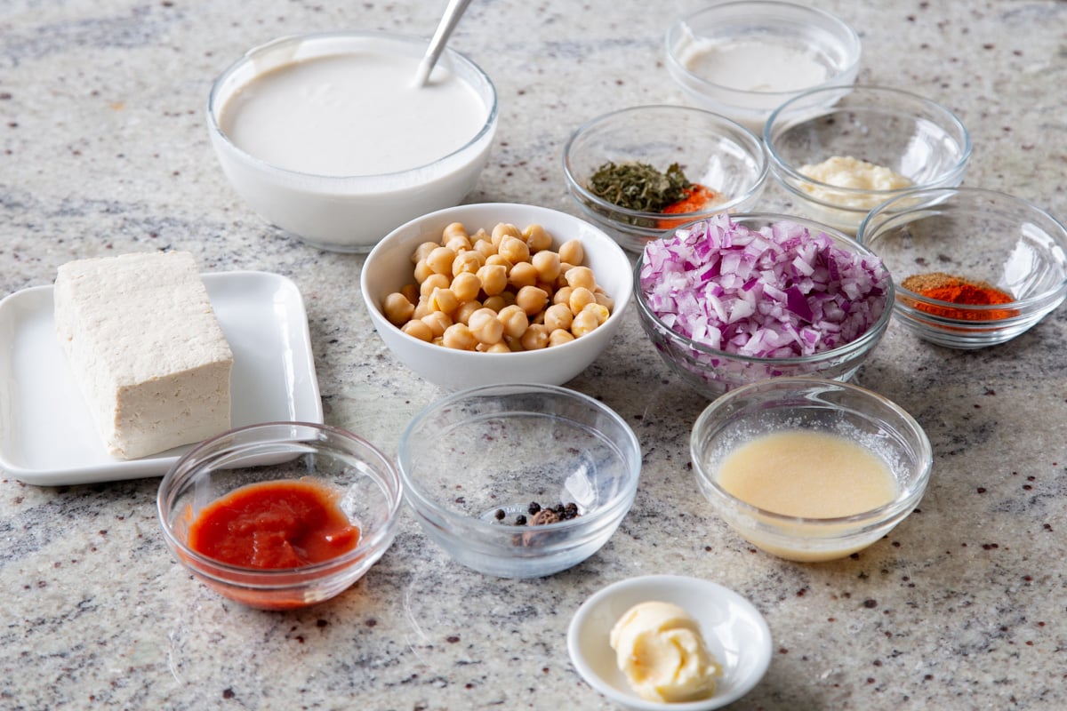kasuri malai murg ingredients in bowls on a kitchen countertop