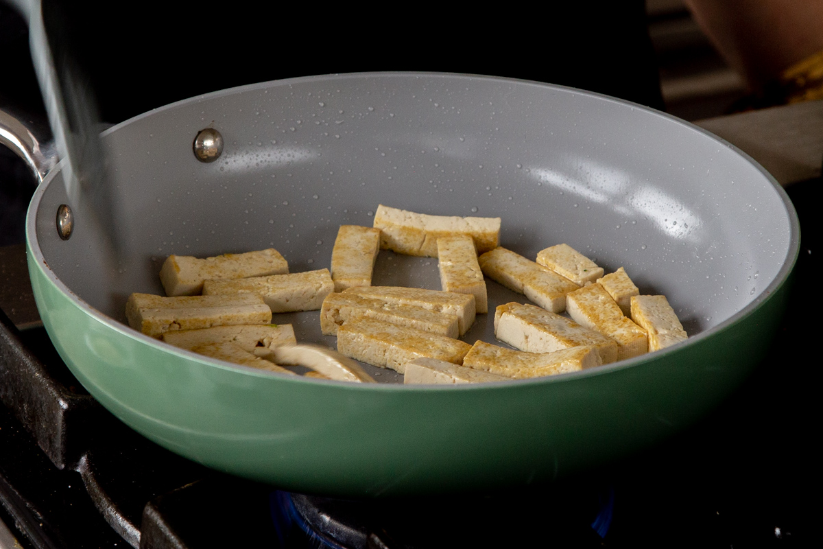 pan frying tofu in the pan